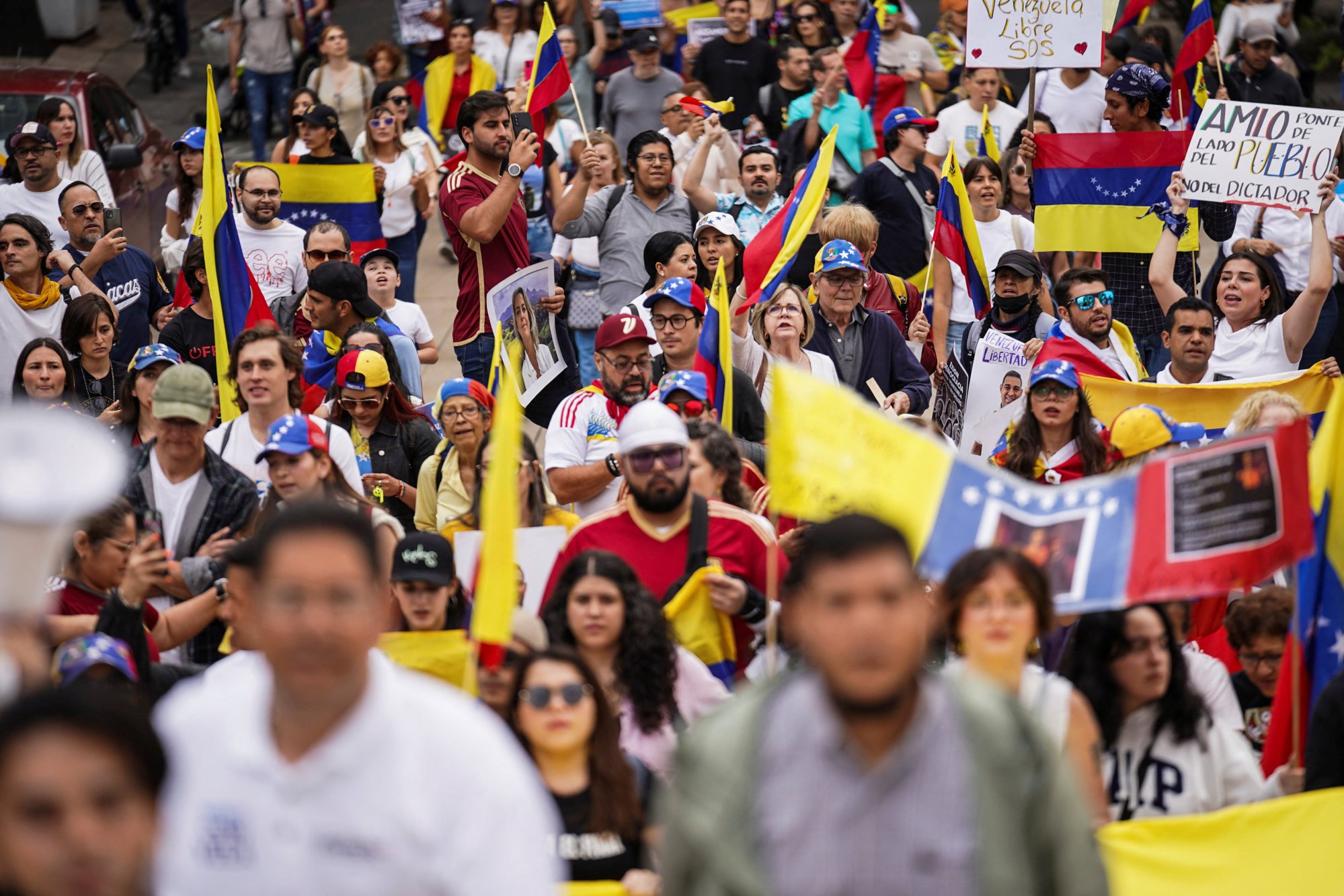 Demonstrators in Mexico City on Saturday protest against election results that awarded Venezuelan President Nicolas Maduro a third term in office. Photo: Reuters