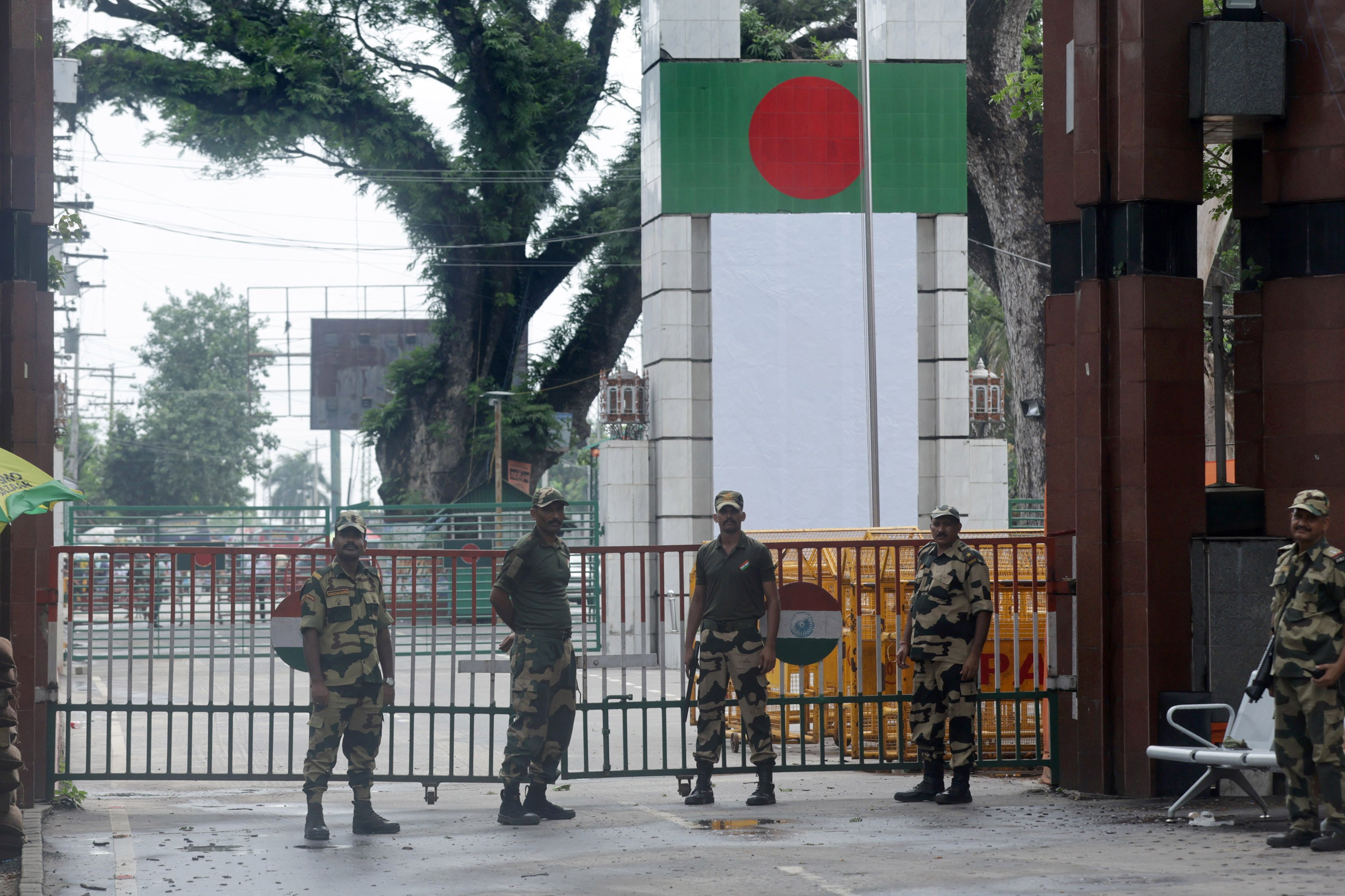 Indian Border Security Force officers stand guard at the Petrapole-Benapole border between India and Bangladesh on Friday. Photo: EPA-EFE