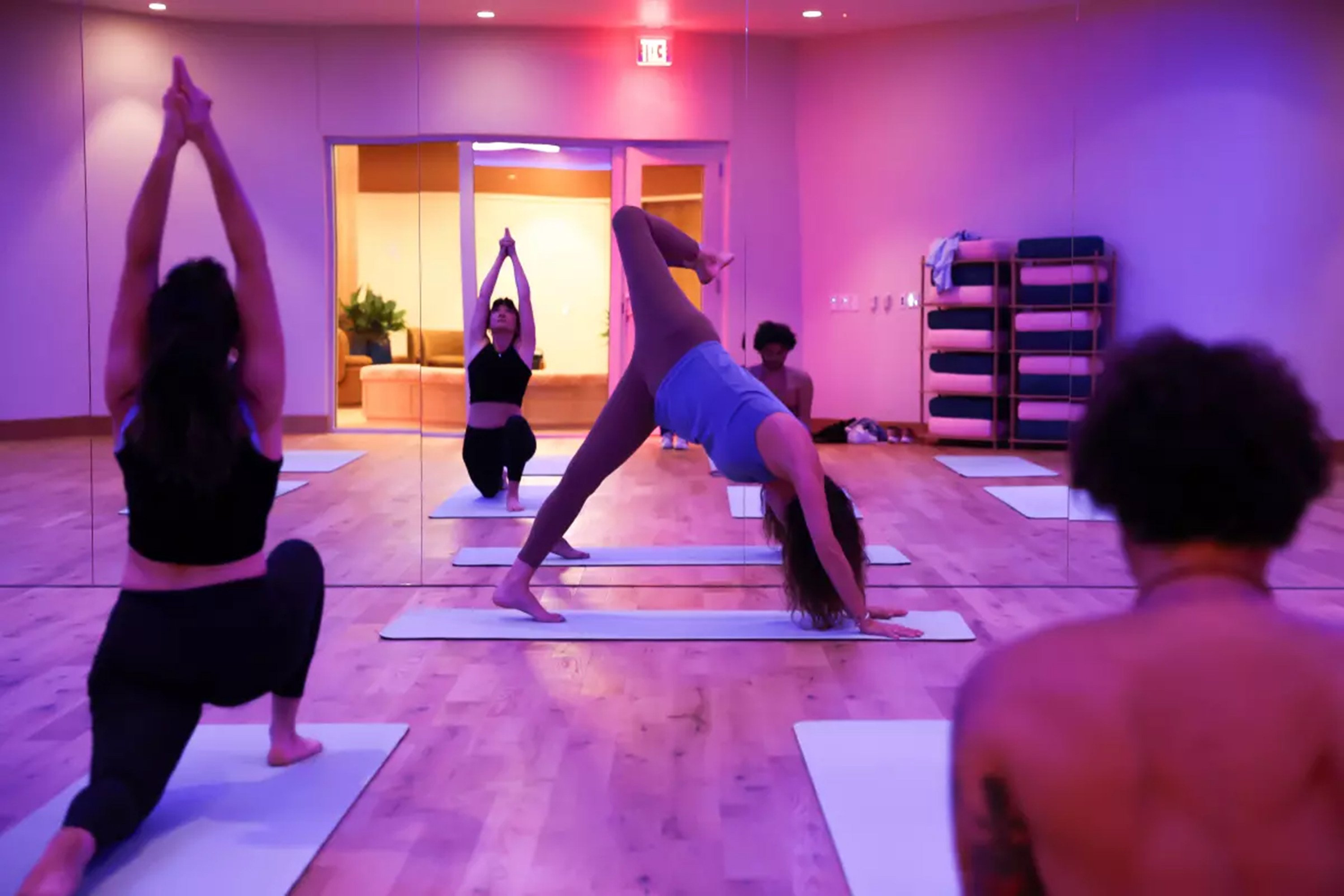 Love.Life team members demonstrate a yoga class at the new luxury health centre, created by Whole Foods co-founder John Mackey, in Los Angeles in the US. Photo: TNS