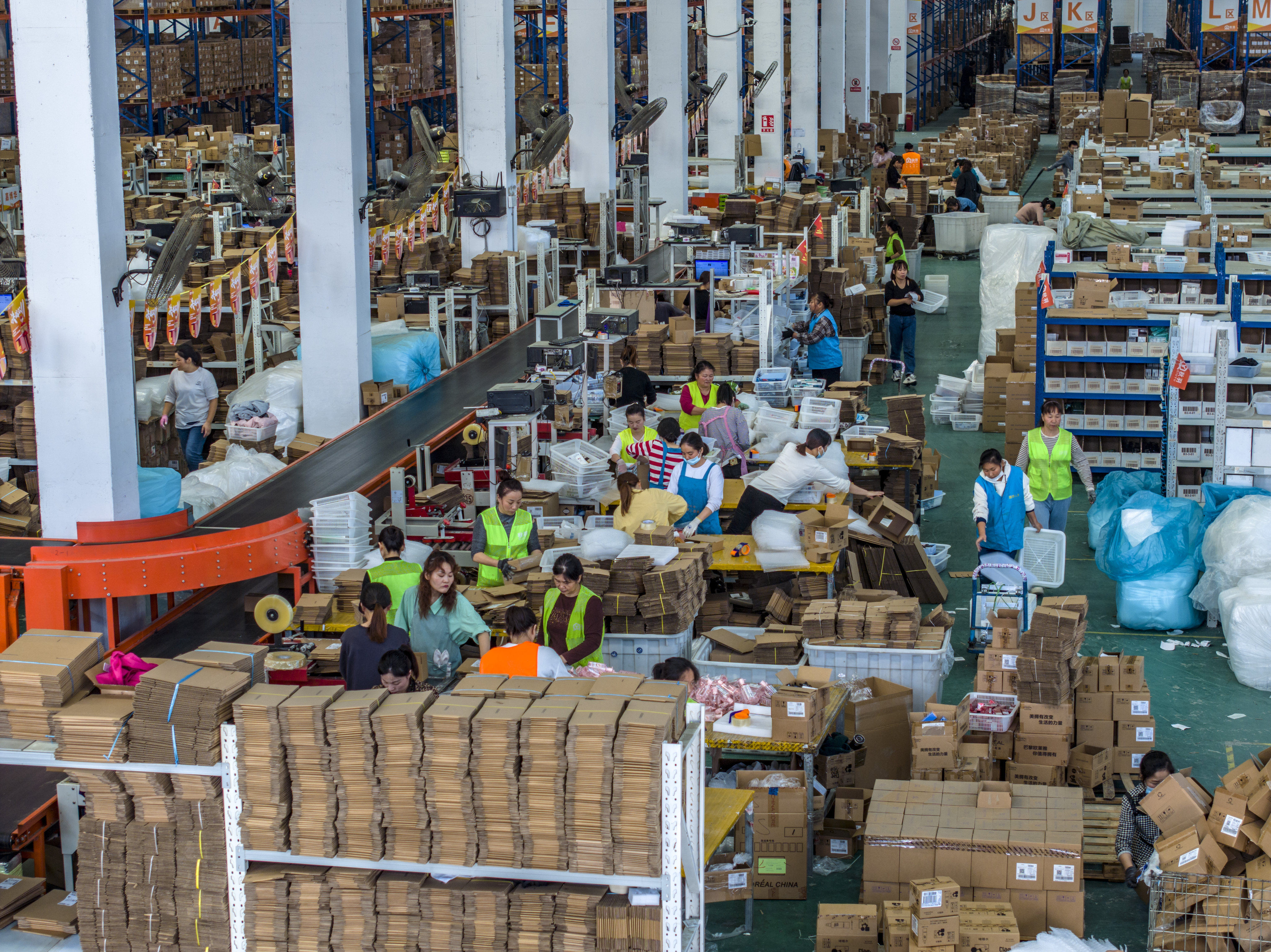 China’s courier sector, fuelled by an e-commerce boom, has seen record highs for package deliveries this year. Photo: Getty Images