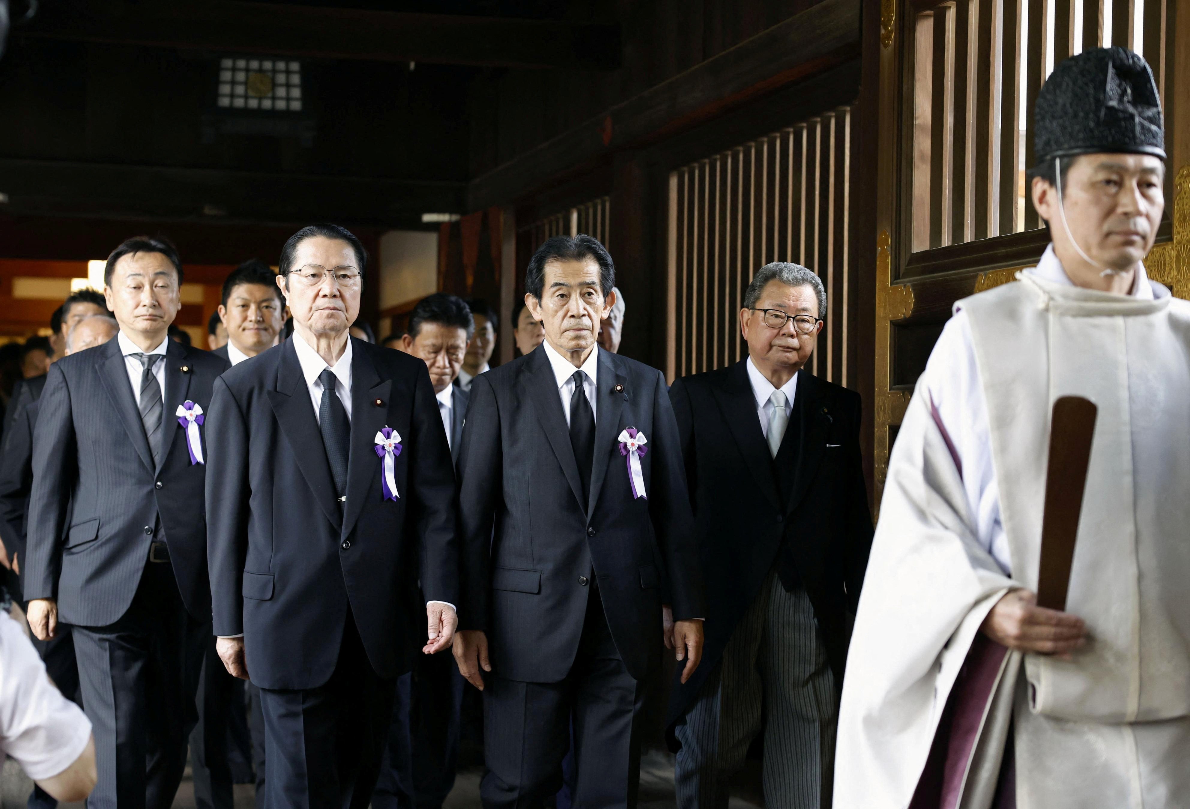 Japanese lawmakers visit Yasukuni shrine. Photo: Kyodo/via Reuters