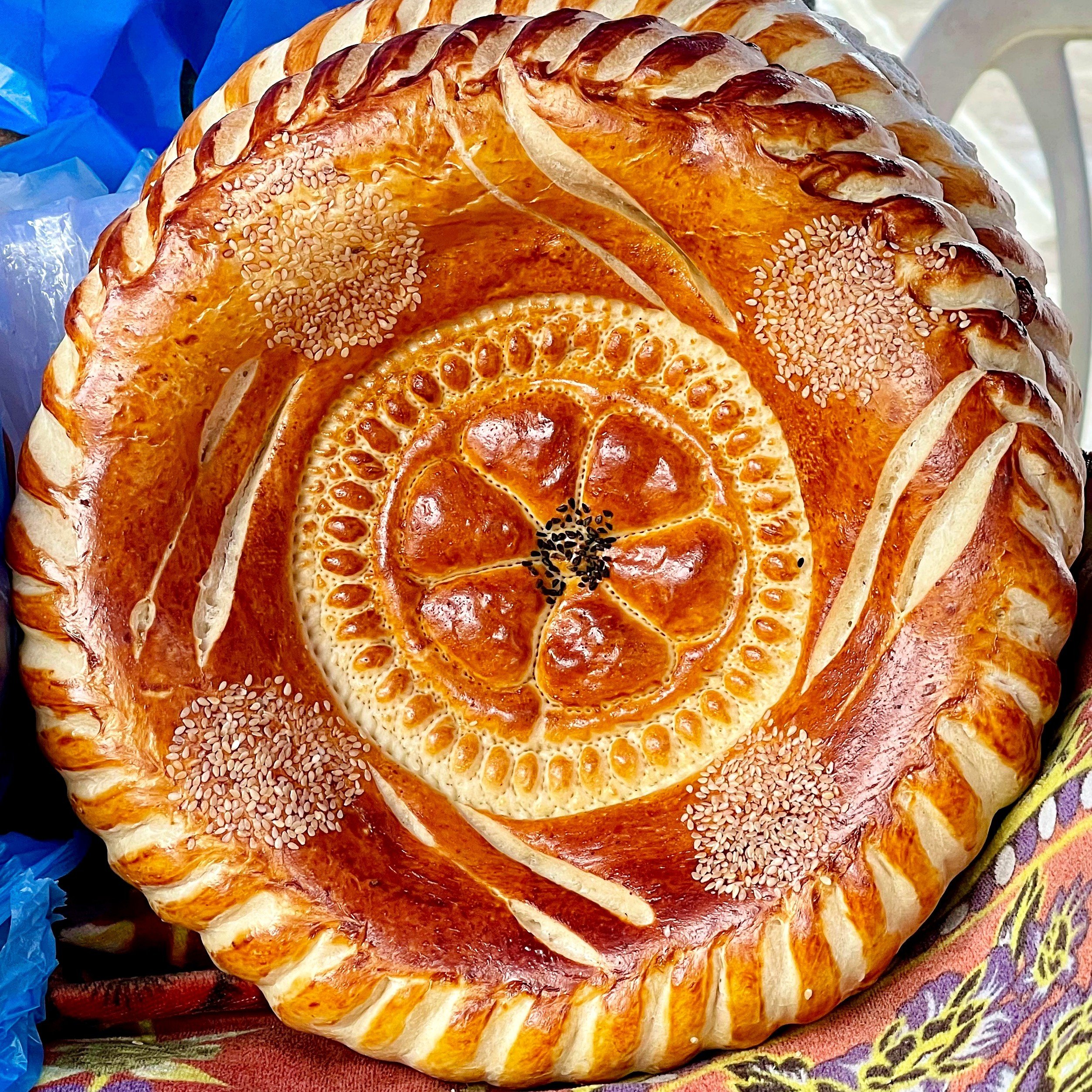 A loaf of bread - known as “non” in Uzbekistan - with intricate designs, baked in the artistic Fergana Valley style. Photo: Anne Pinto-Rodrigues