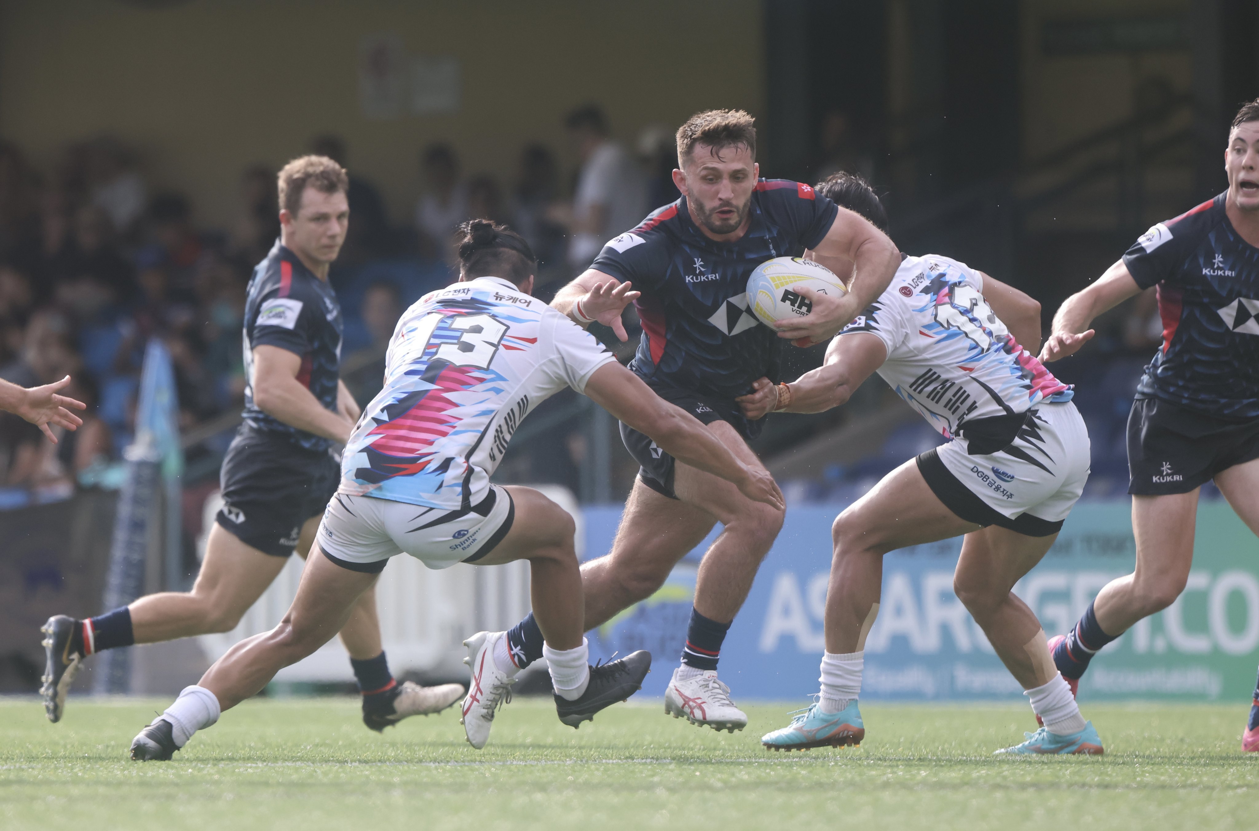 Hong Kong’s Ben Axten-Burrett in possession against South Korea in this year’s Asia Rugby Championship. Photo: Jonathan Wong