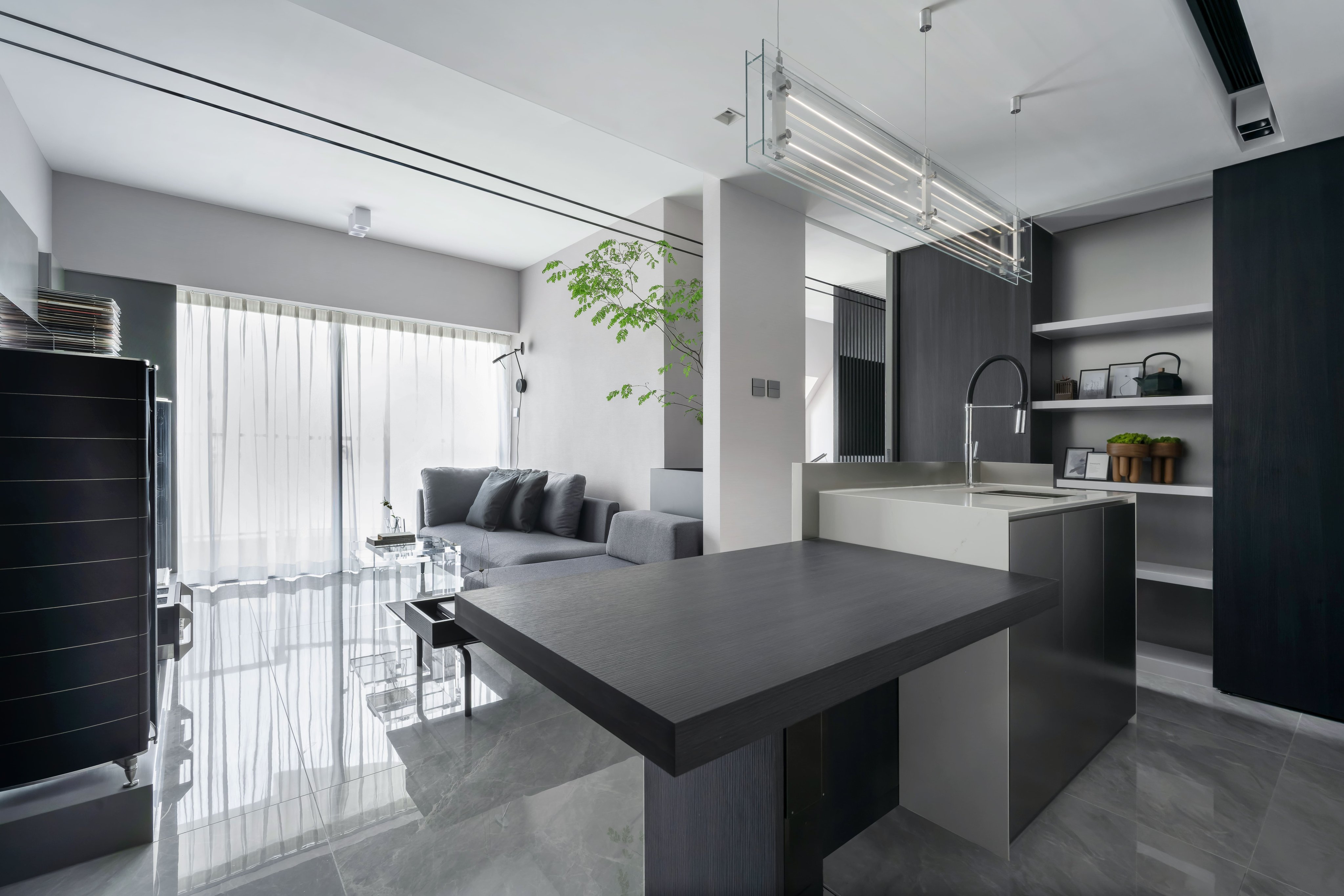 Classy grey tones permeate this Sai Wan Ho, Hong Kong flat done up by Millimeter Interior Design. Photo: Steven Ko Interior Photography