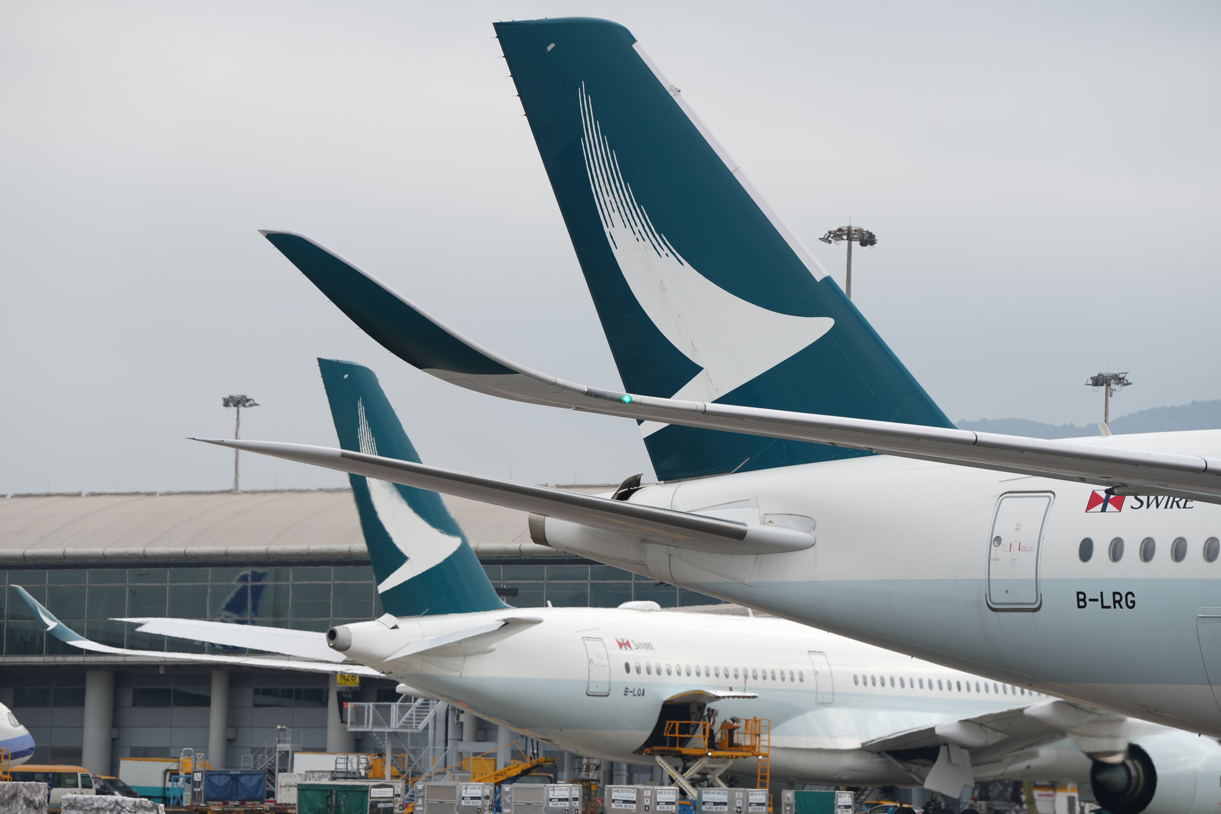 Cathay Pacific planes parked at the Hong Kong International Airport. Photo: Sam Tsang