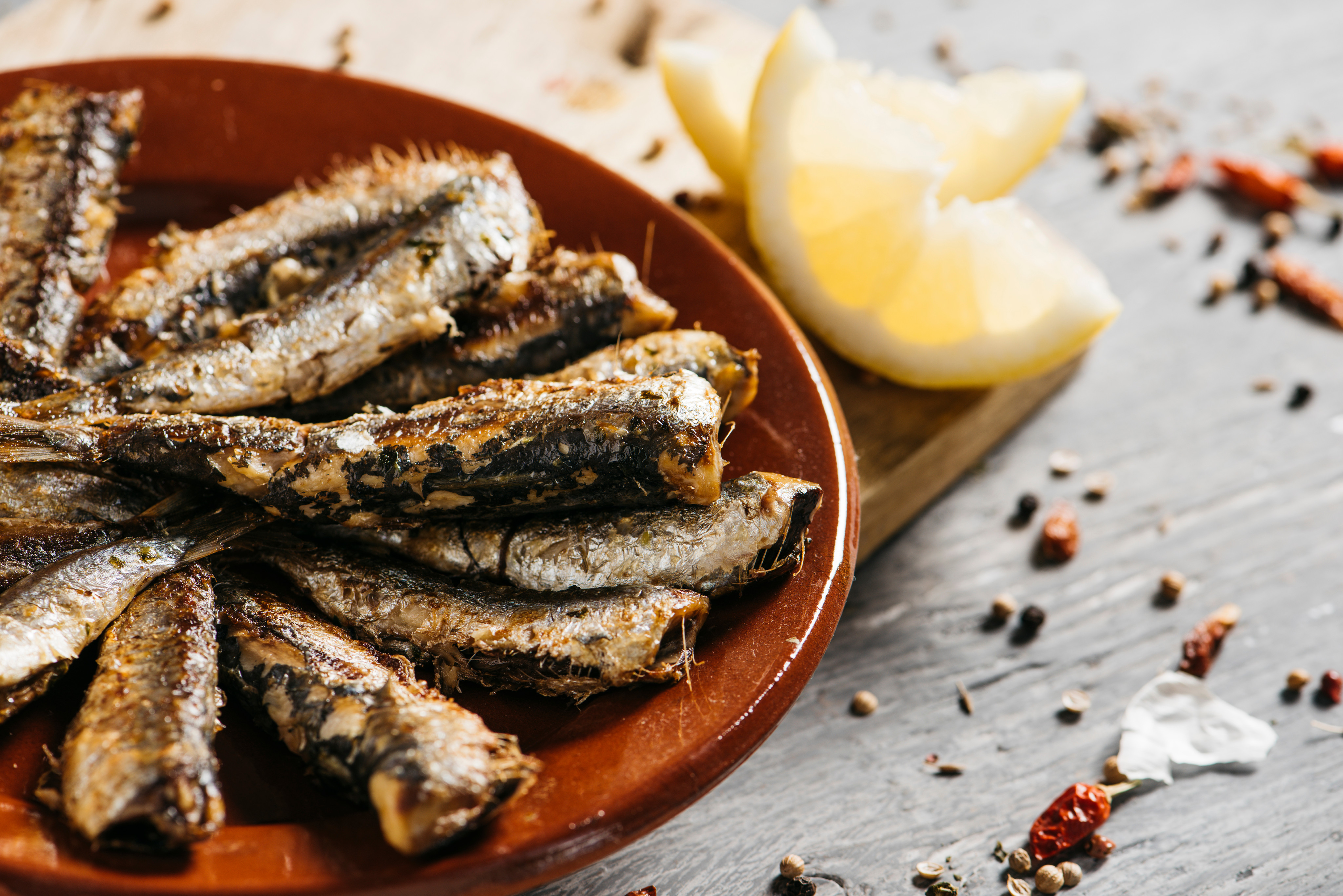 Hong Kong Sardine Festival will  will bring a taste of Portugal to the heart of Hong Kong. Here, grilled sardines are served on a brown earthenware plate. Photo: Handout