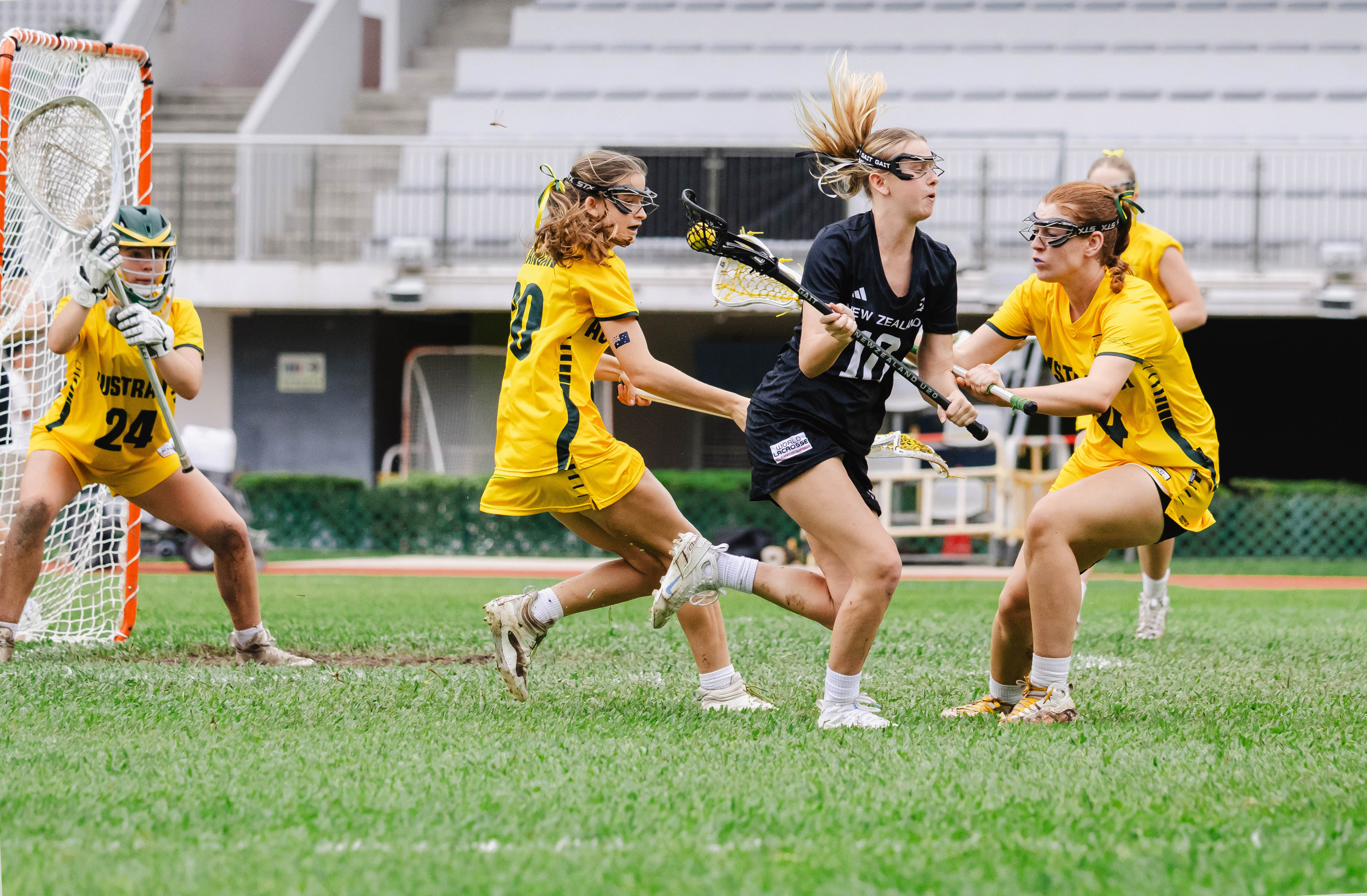 Sienna Neill (in black) of New Zealand in possession against Australia at Sham Shui Po Sports Ground on Friday. Photo: Vivian Lee