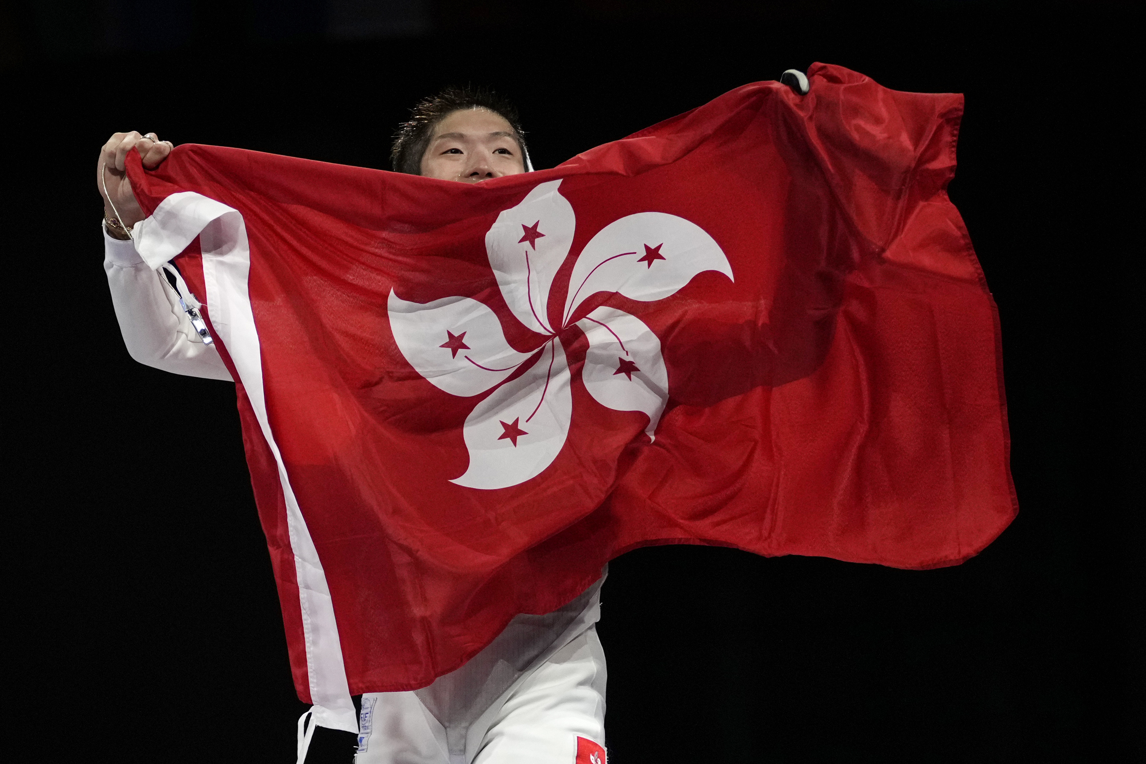 Hong Kong’s Cheung Ka-long celebrates after winning the men’s individual foil final match against Italy’s Filippo Macchi at the Paris 2024 Summer Olympics. Photo: AP