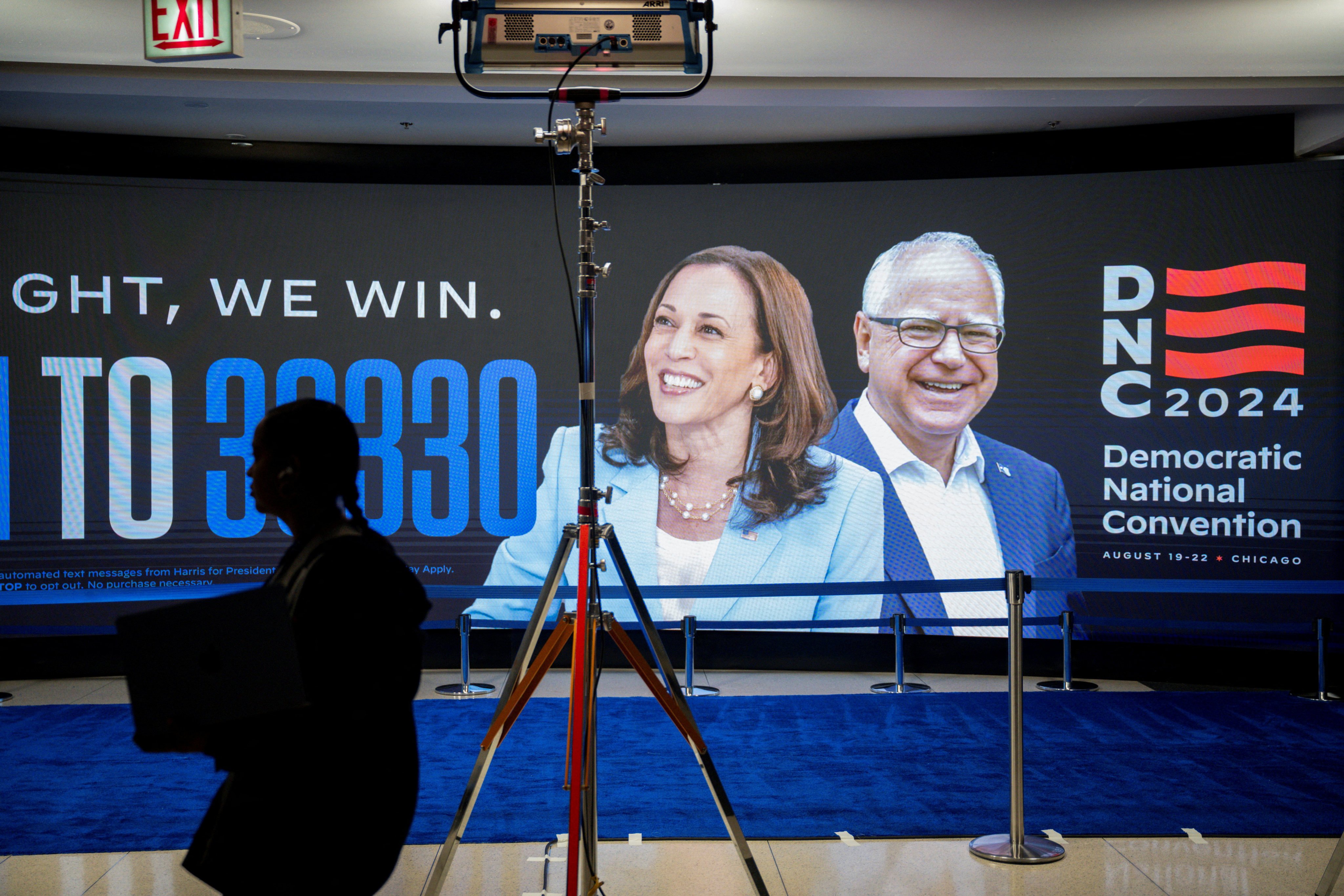 A sign bearing the images of US Vice-President Kamala Harris and her running mate on the 2024 Democratic Party ticket, Minnesota Governor Tim Walz, in Chicago, Illinois, on Friday. Photo: Reuters