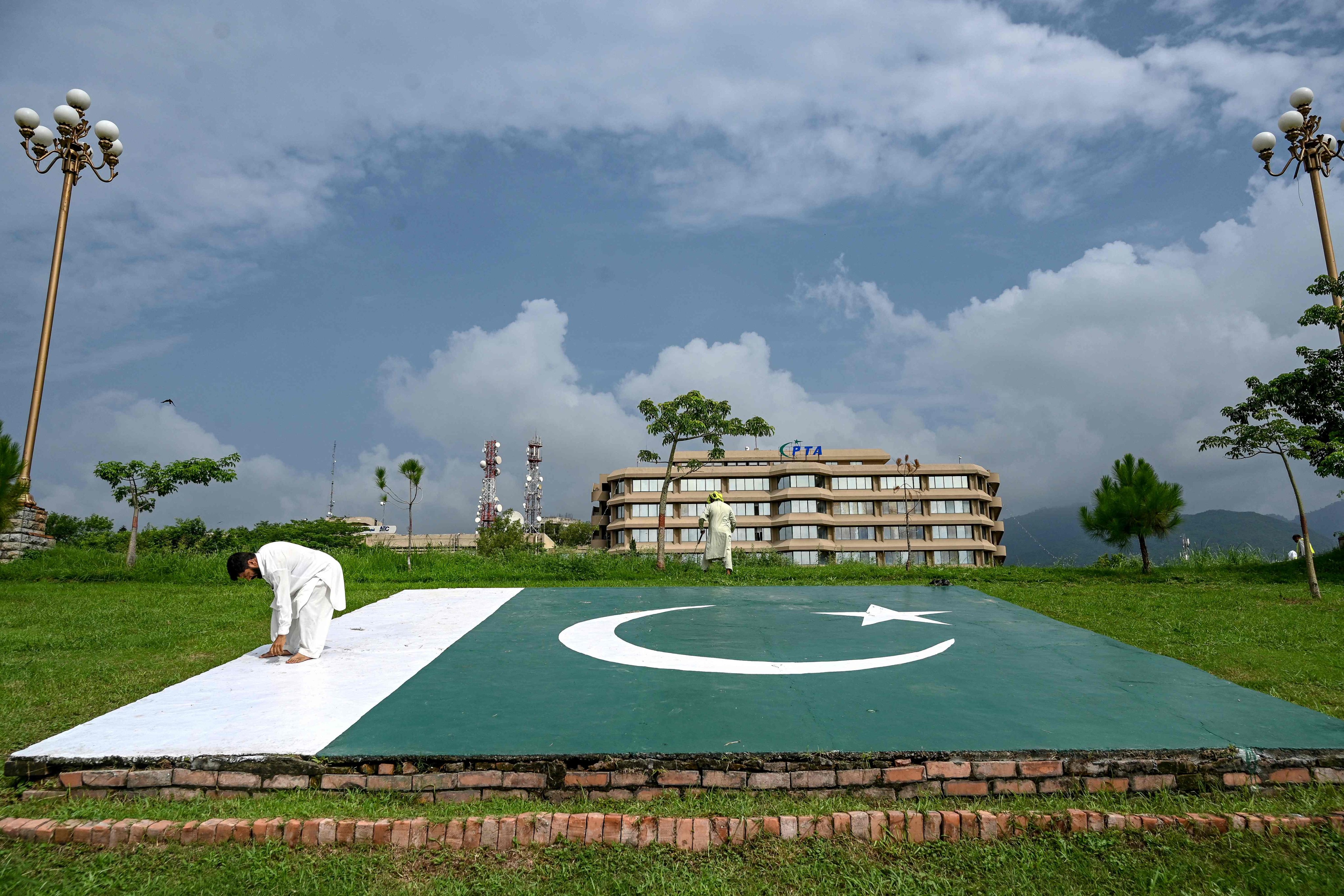 People work near the Pakistan Telecommunication Authority (PTA) headquarters building in Islamabad on August 16, 2024. Photo: AFP