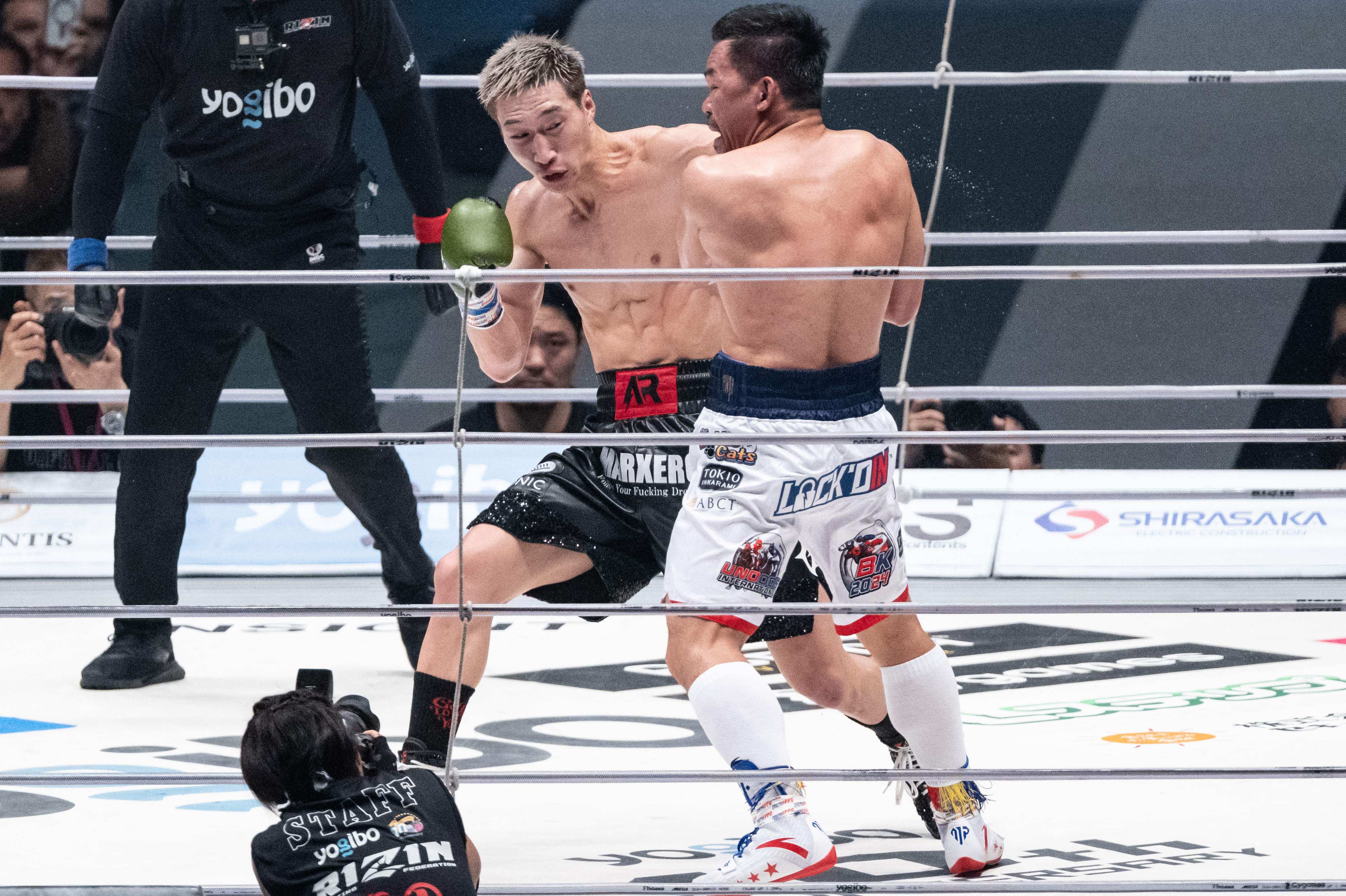 Japanese MMA star Rukiya Anpo (left) seemed to dominate Philippines boxing legend Manny Pacquiao in their drawn exhibition boxing match last month. Photo: AFP