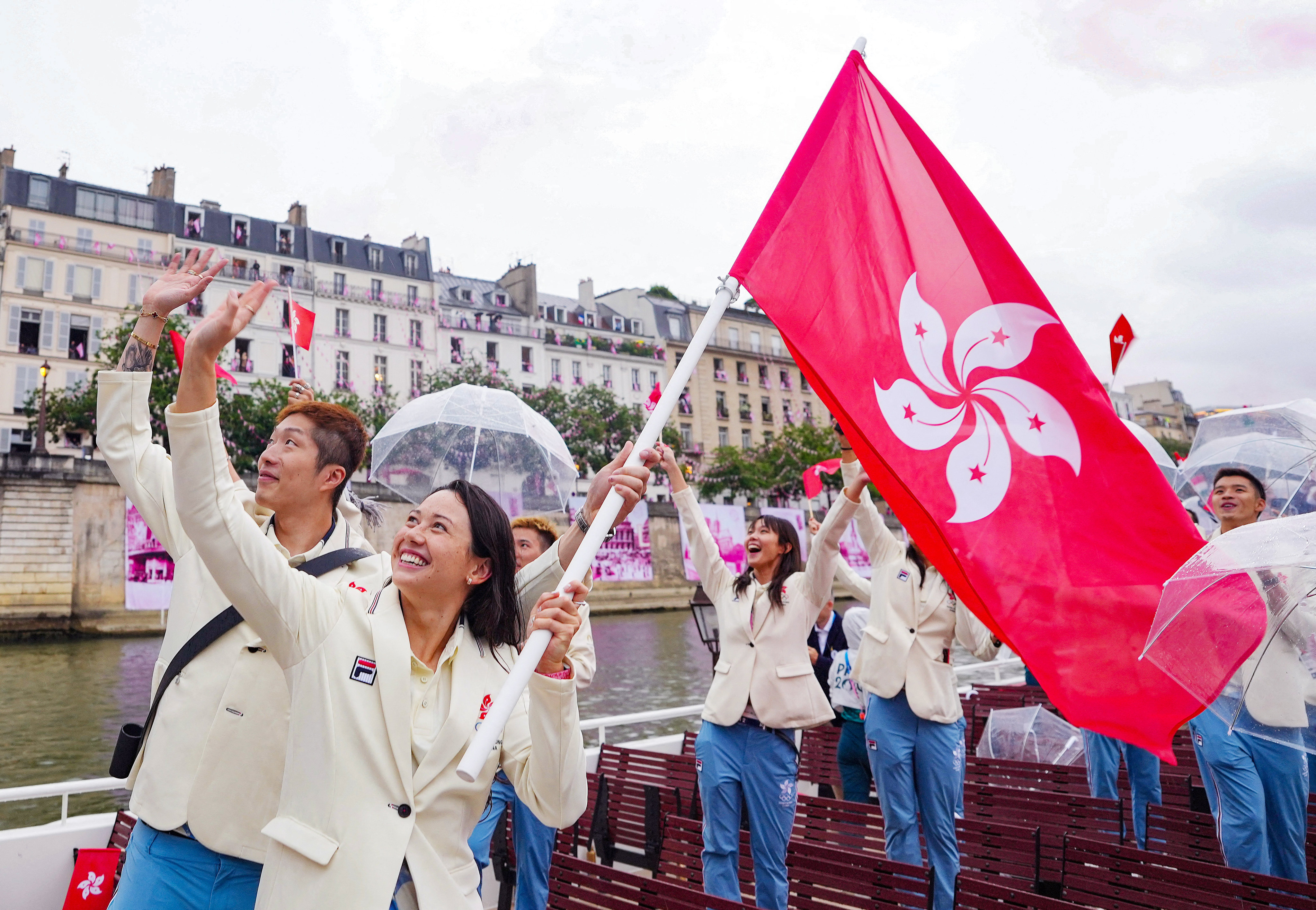 Members of the Hong Kong delegation wave to fans at the opening ceremony of the Paris Olympic Games earlier this month. Photo: Reuters