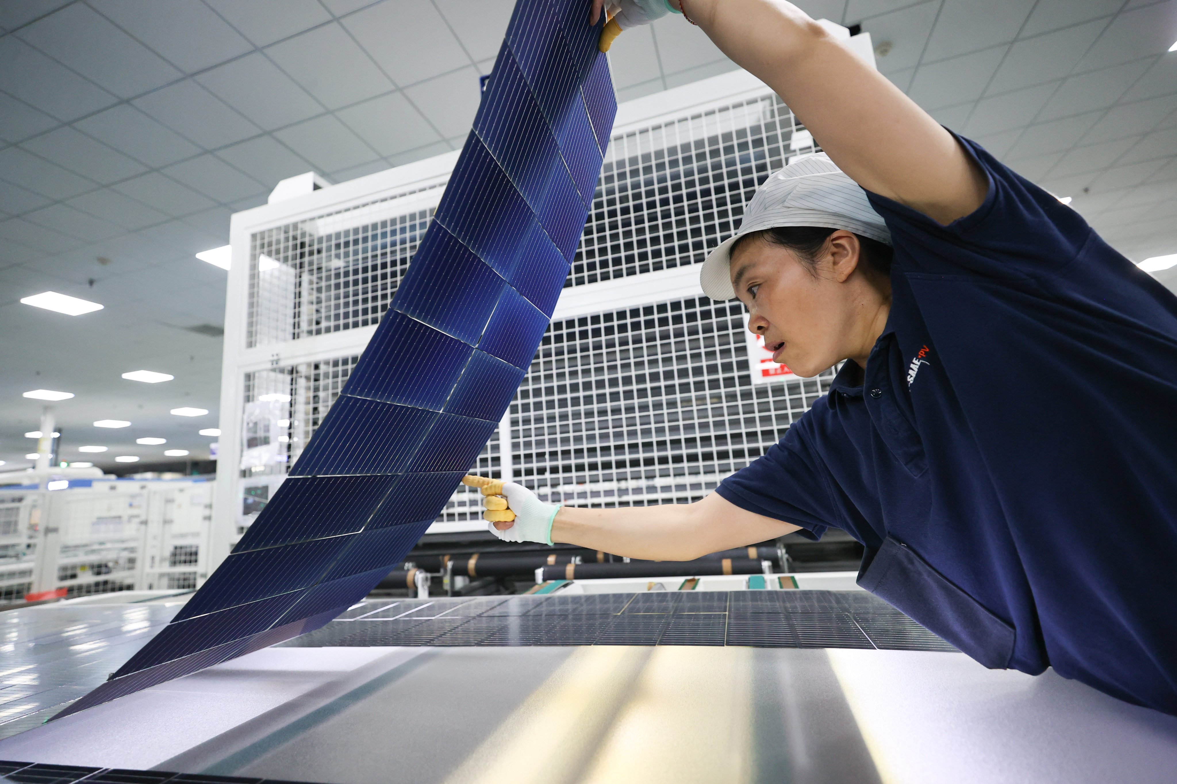 A worker produces solar modules for export at a new energy enterprise in Lianyungang, in east China’s Jiangsu province, on June 24, 2024. Photo: CFOTO/Future Publishing via Getty Images