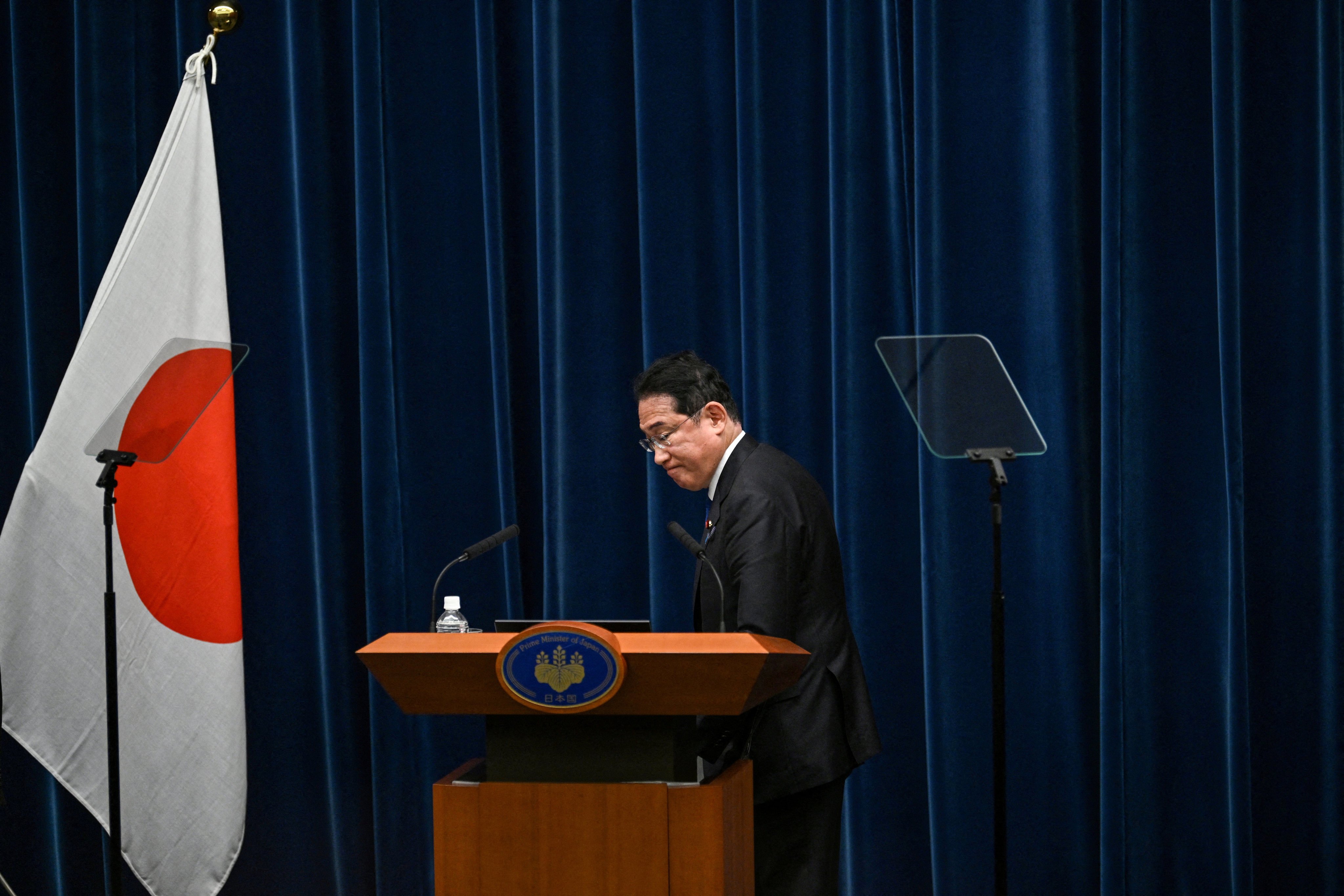 Japan’s Prime Minister Fumio Kishida leaves the August 14 press conference in which he announced he will not seek re-election. Photo: Reuters