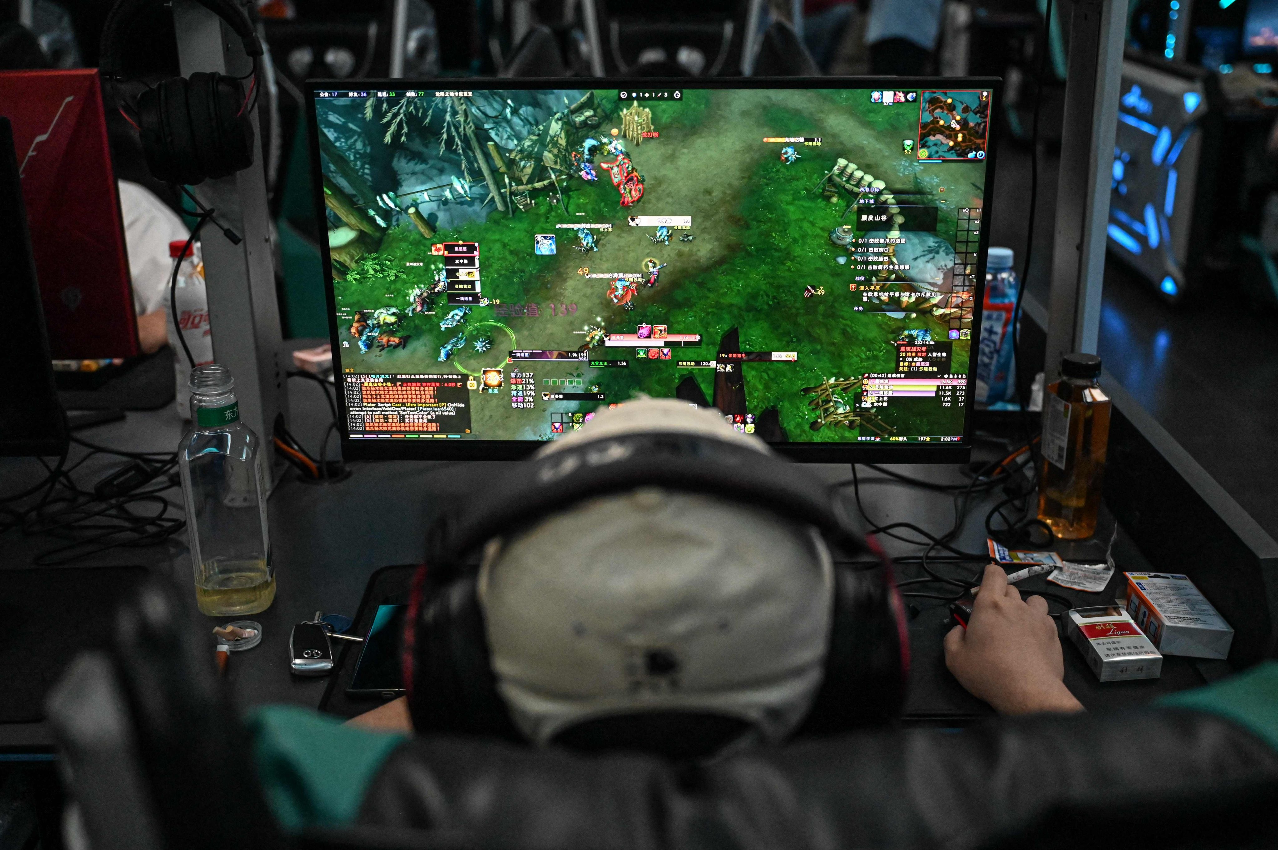 A man plays the online game World of Warcraft at an internet cafe in Beijing. Photo: AFP