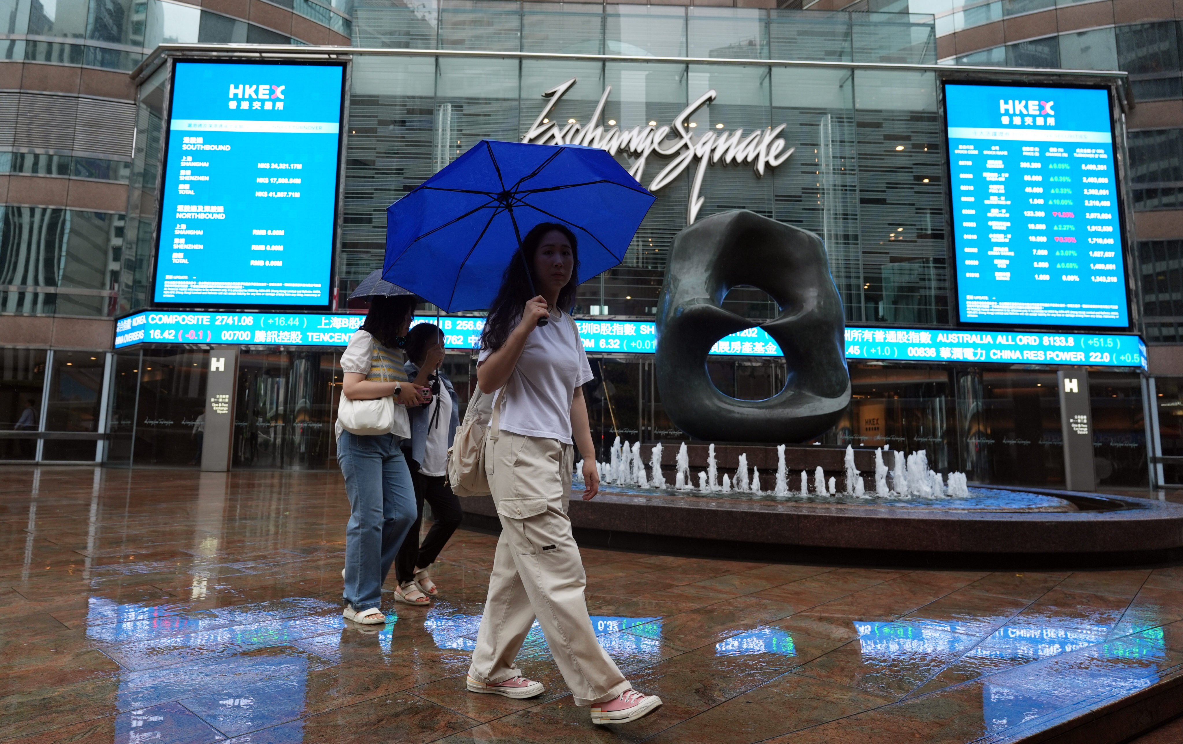 People walking past the Exchange Square in Central in May 2024. Photo: Eugene Lee