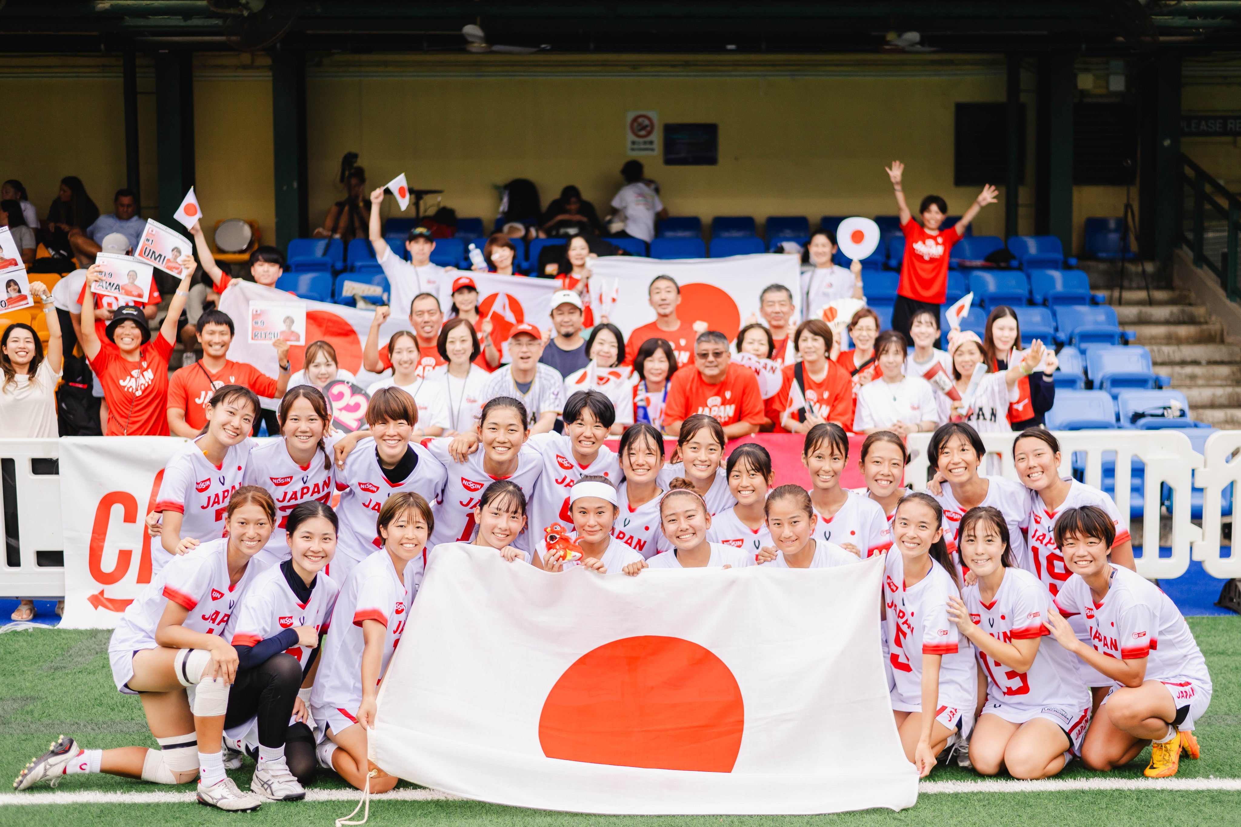 Megan Kitagawa (front row, third from right) with her teammates after Japan reached the semi-finals for the first time. Photo: HKCLA