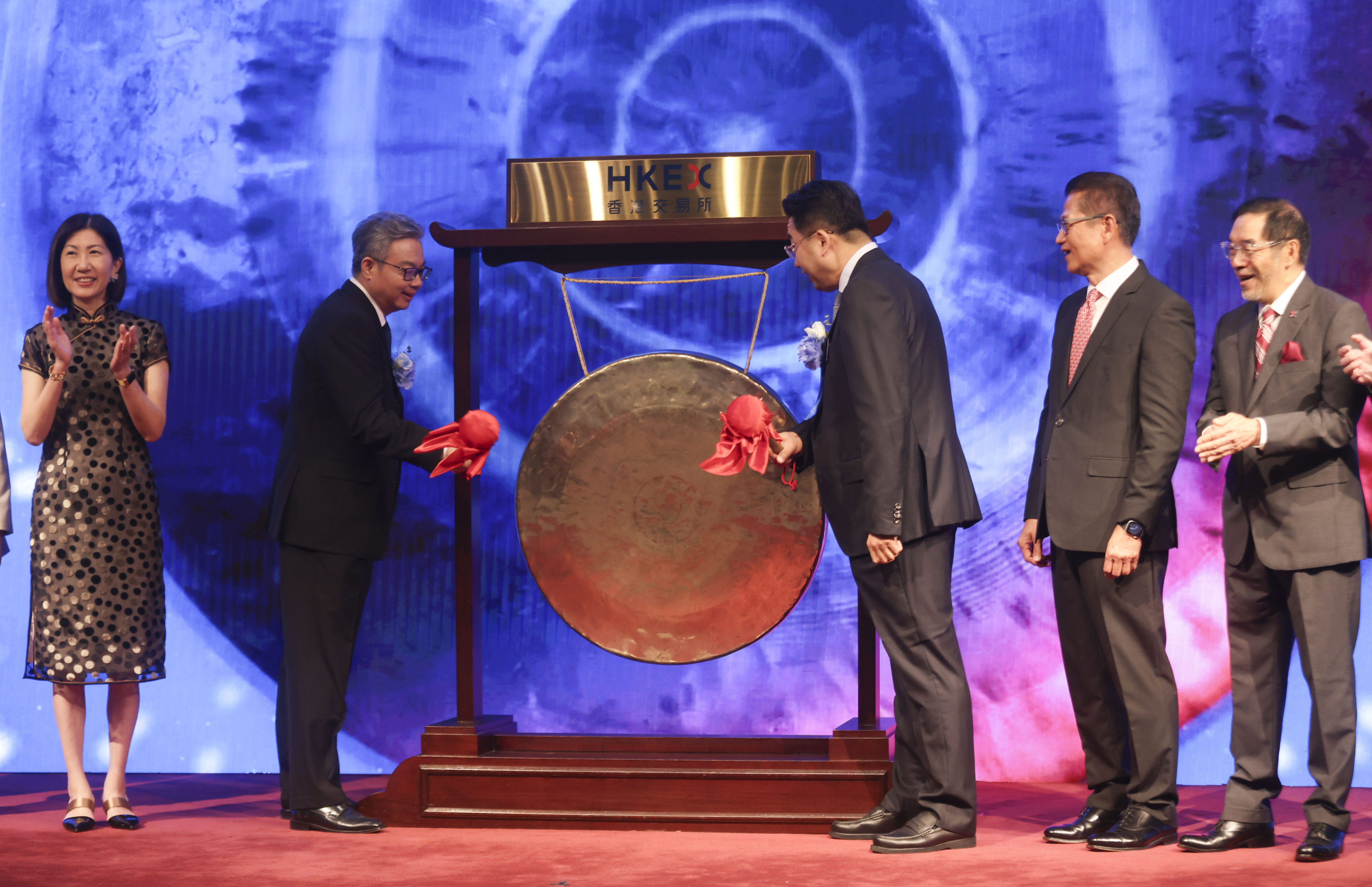 A listing ceremony at the Connect Hall of the Hong Kong stock exchange on 8 August 2024. (L to R) Bonnie Chan Yi-ting, HKEX CEO; Shan Jizhang, co-founder and CEO of Black Sesame International Holding; Liu Weihong, co-founder and president of Black Sesame; Financial Secretary Paul Chan Mo-po; and Carlson Tong Ka-shing, HKEX chairman. Photo: Jonathan Wong.