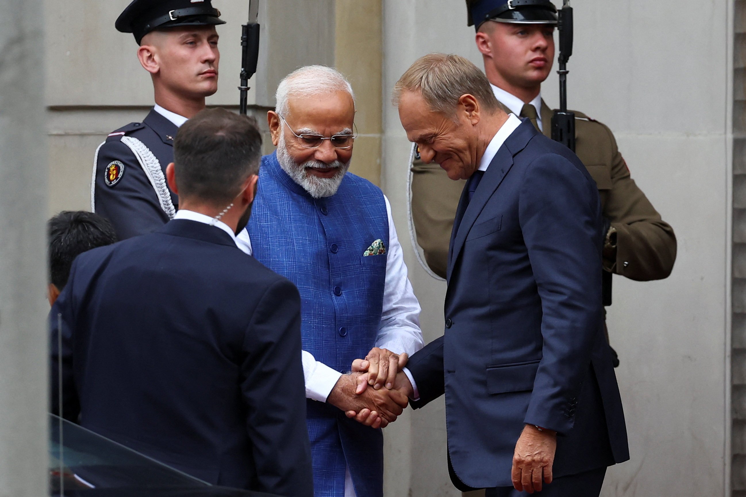 Indian Prime Minister Narendra Modi (left) shakes hands with Polish Prime Minister Donald Tusk as he leaves the Chancellery of the Prime Minister in Warsaw. Photo: Reuters