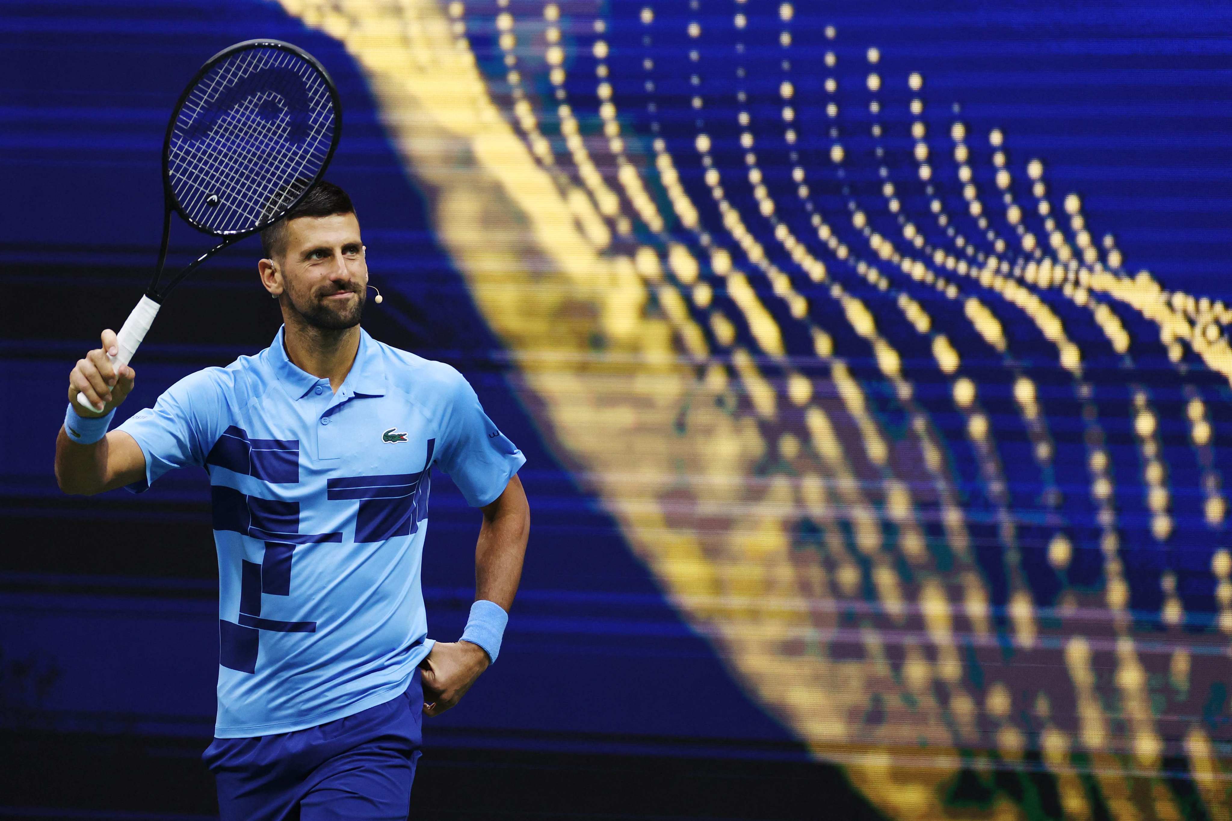 Novak Djokovic acknowledges the crowd before playing in an exhibition match at USTA Billie Jean King National Tennis Centre on August 21. Photo: Getty Images