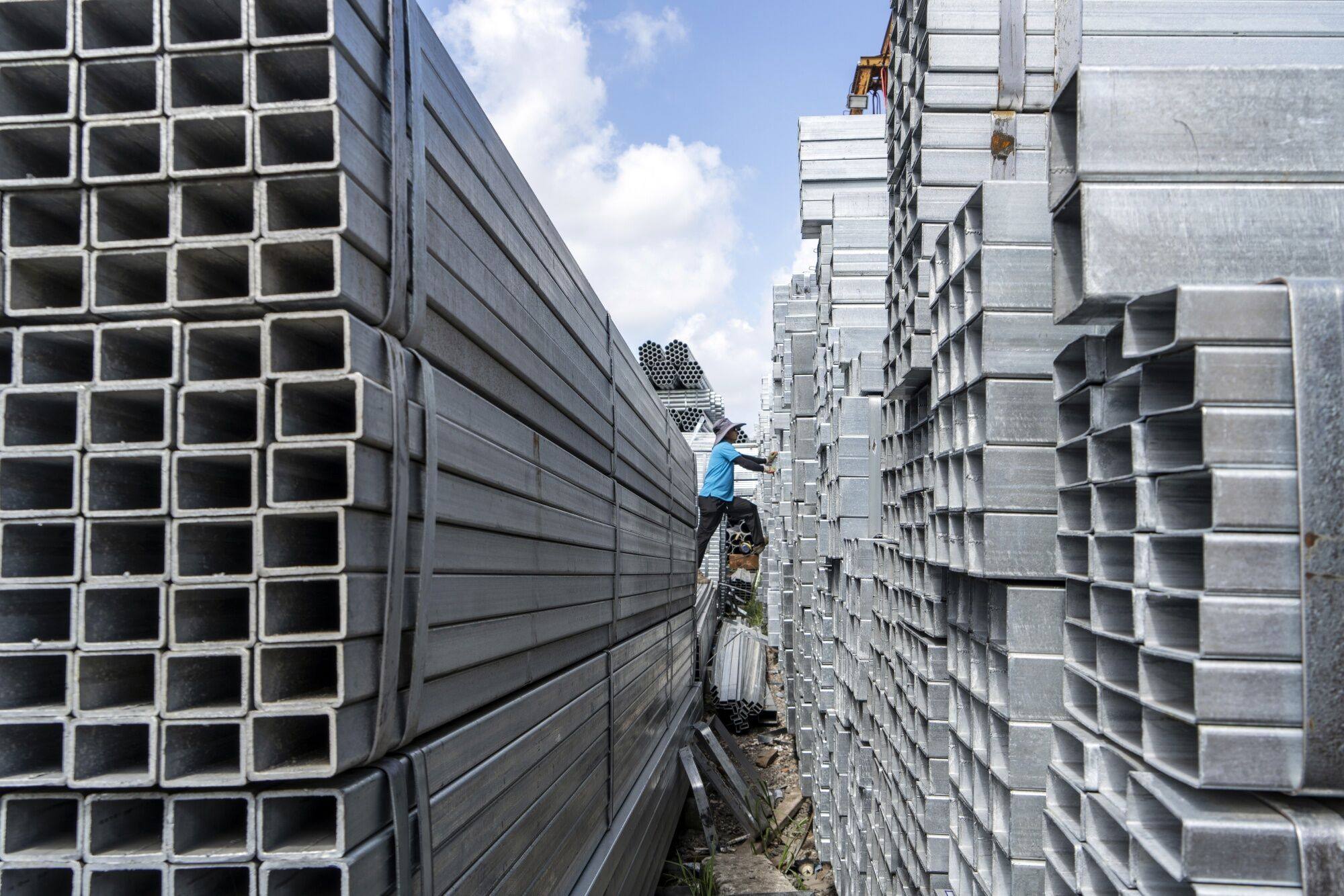 Bundles of steel tubes at a trading market in the outskirts of Shangha. Photo: Bloomberg