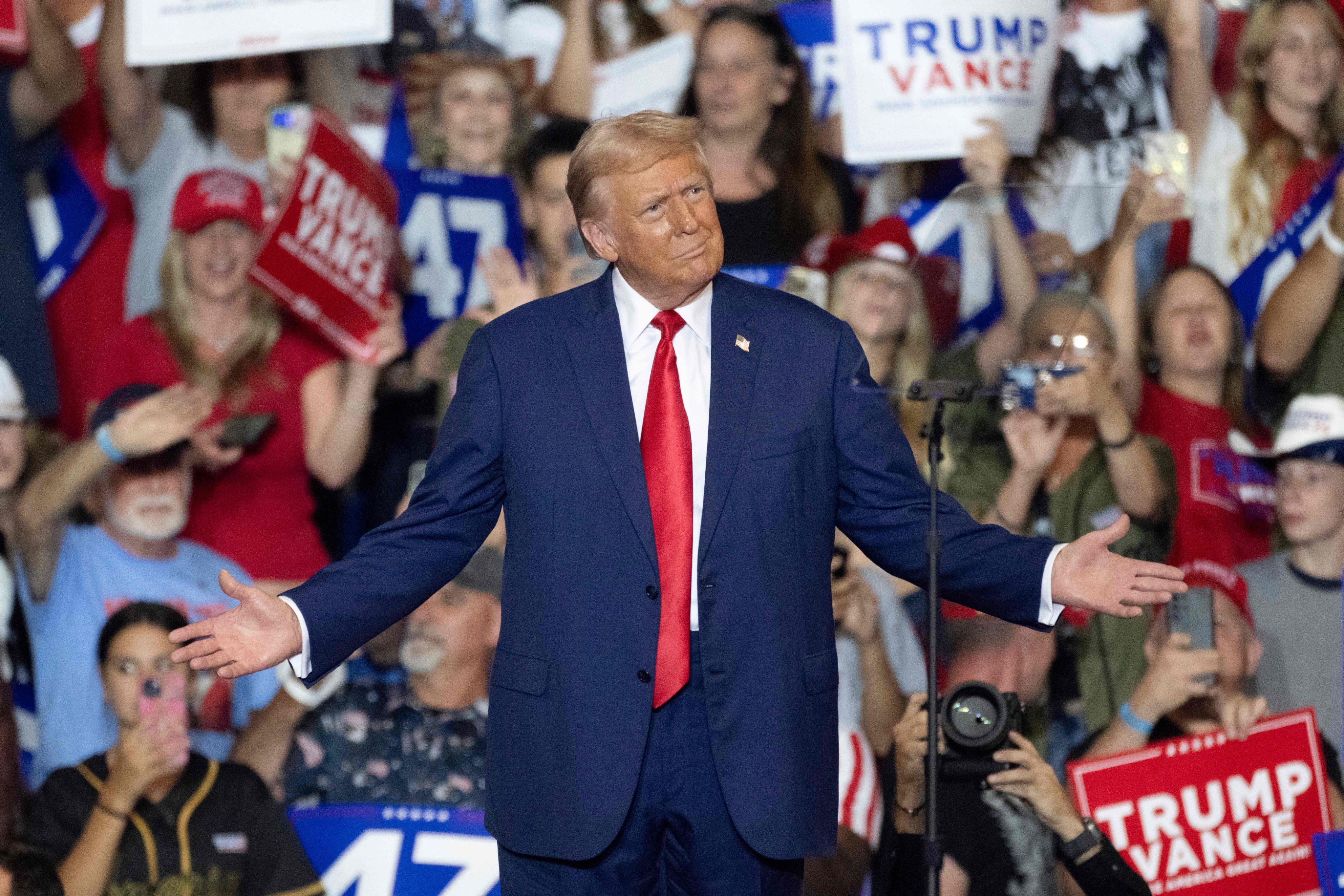 Former US president and Republican presidential candidate Donald Trump gestures as he speaks during a campaign rally at Mohegan Sun Arena in Wilkes-Barre, Pennsylvania, on August 17. Photo: AFP