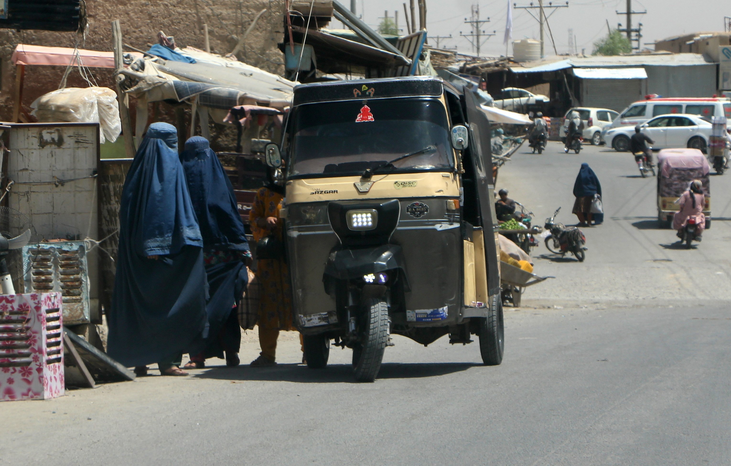 Burqa-clad Afghan women in Kandahar. The Taliban say they respect women’s rights in accordance with their interpretation of Islamic law and local customs. Photo:  EPA-EFE