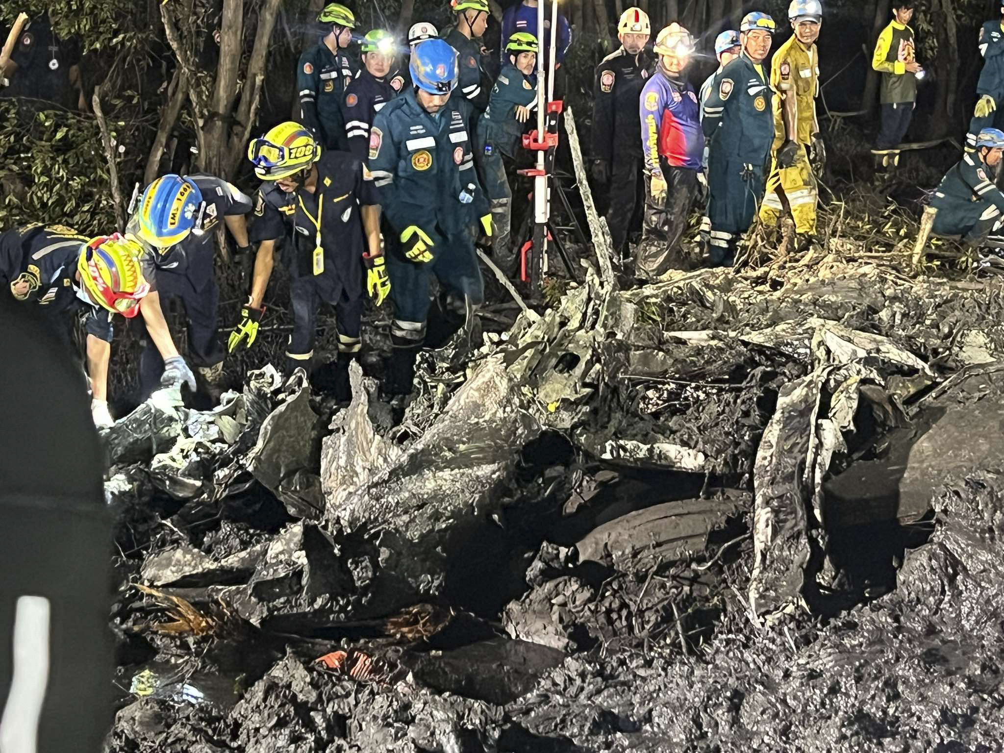 Rescuers work at the site of a plane crash in Thailand’s Chachoengsao province on Thursday. Photo: Chachoengsao’s Public Relations Department via AP