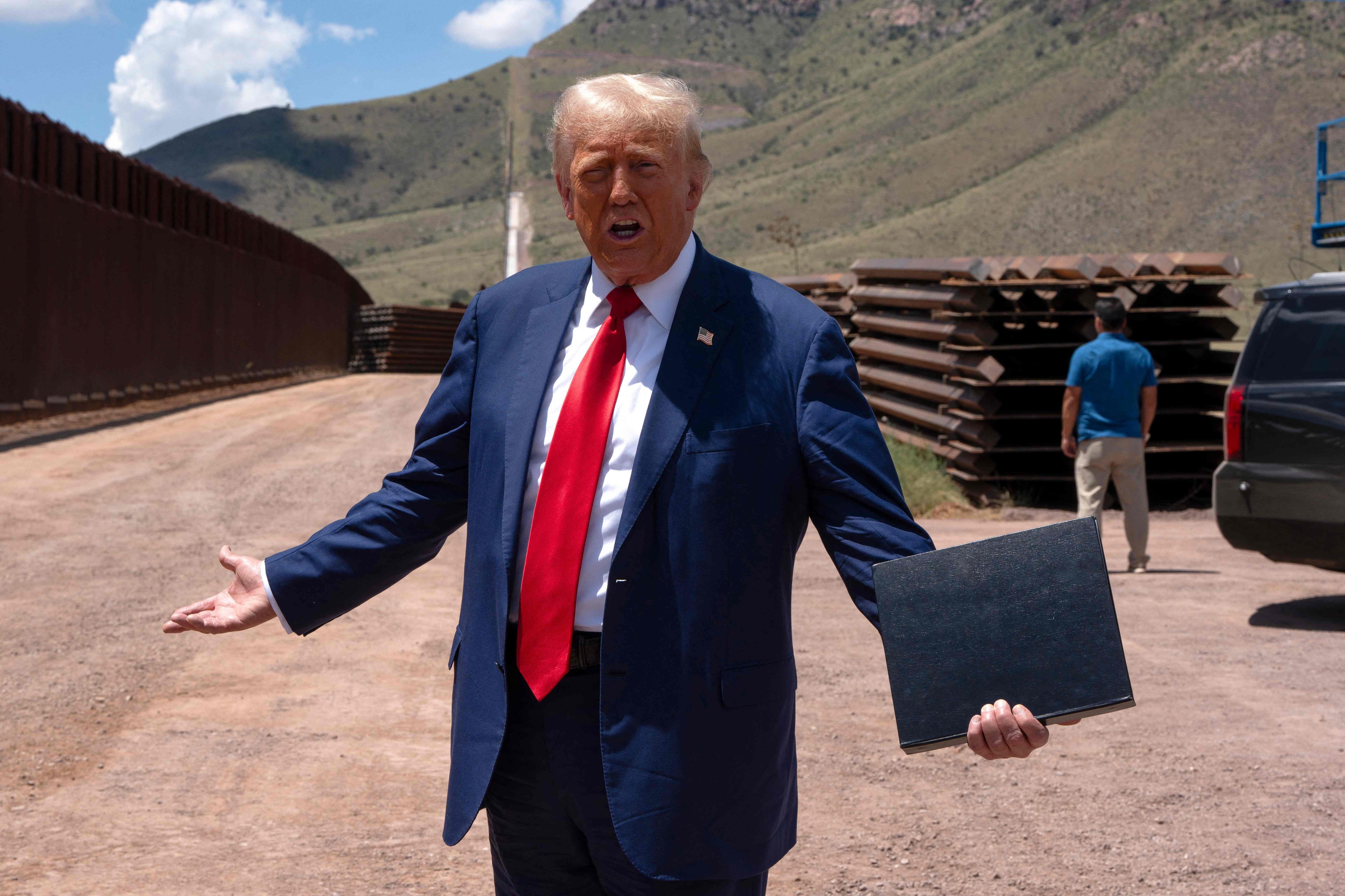 Former president Donald Trump speaks at the US-Mexico border in Arizona on August 22. Photo: Getty Images via AFP