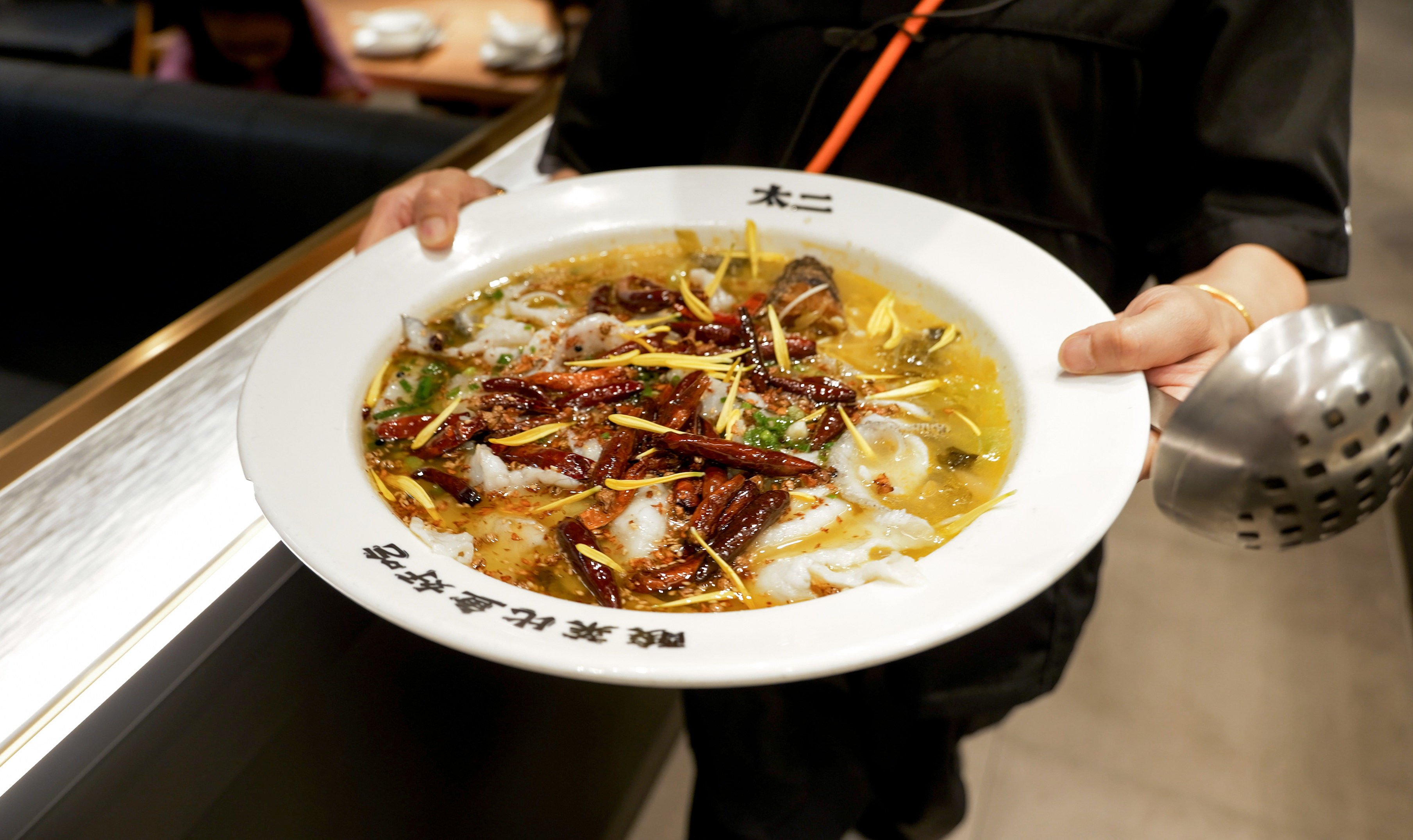 Mainland restaurant chain Tai Er Chinese Sauerkraut Fish, with its signature dish Suancai Fish, or Sichuan-style fish poached in a rich broth made from fish stock and  pickled Chinese cabbage. Photo: Daniel Suen