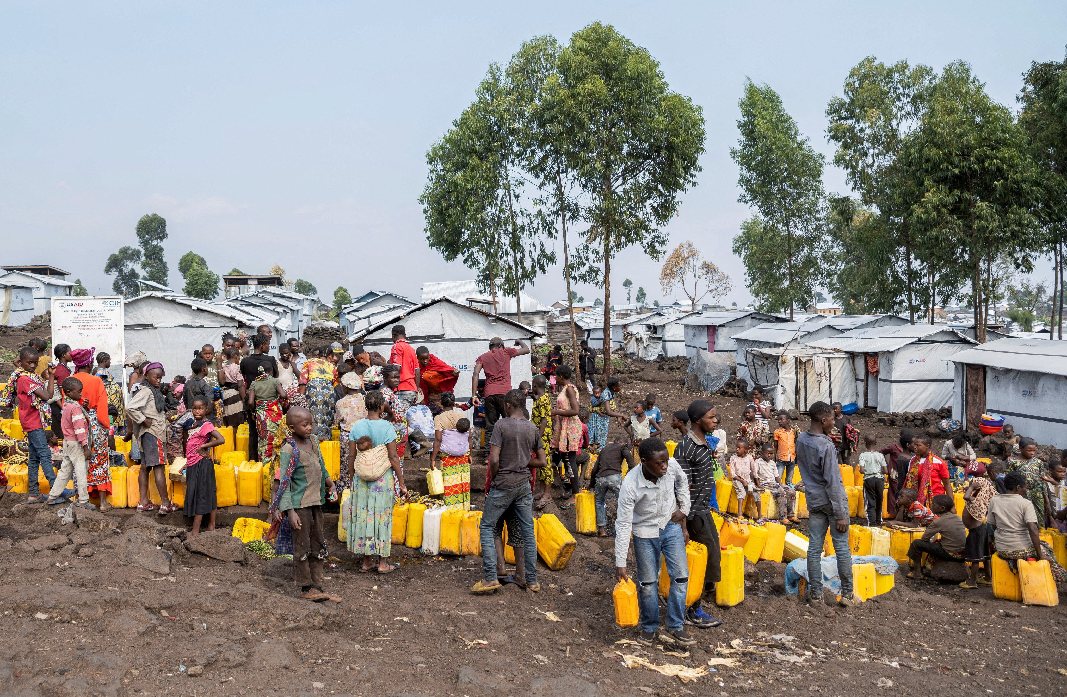 People collect water from taps at the Muja camp for internally displaced persons amid an outbreak of Mpox in Nyiragongo territory, near Goma in North Kivu province of the Democratic Republic of Congo (DRC) on August 19, 2024. The DRC has reported 16,700 cases and 570 deaths from mpox this year. Photo: Reuters