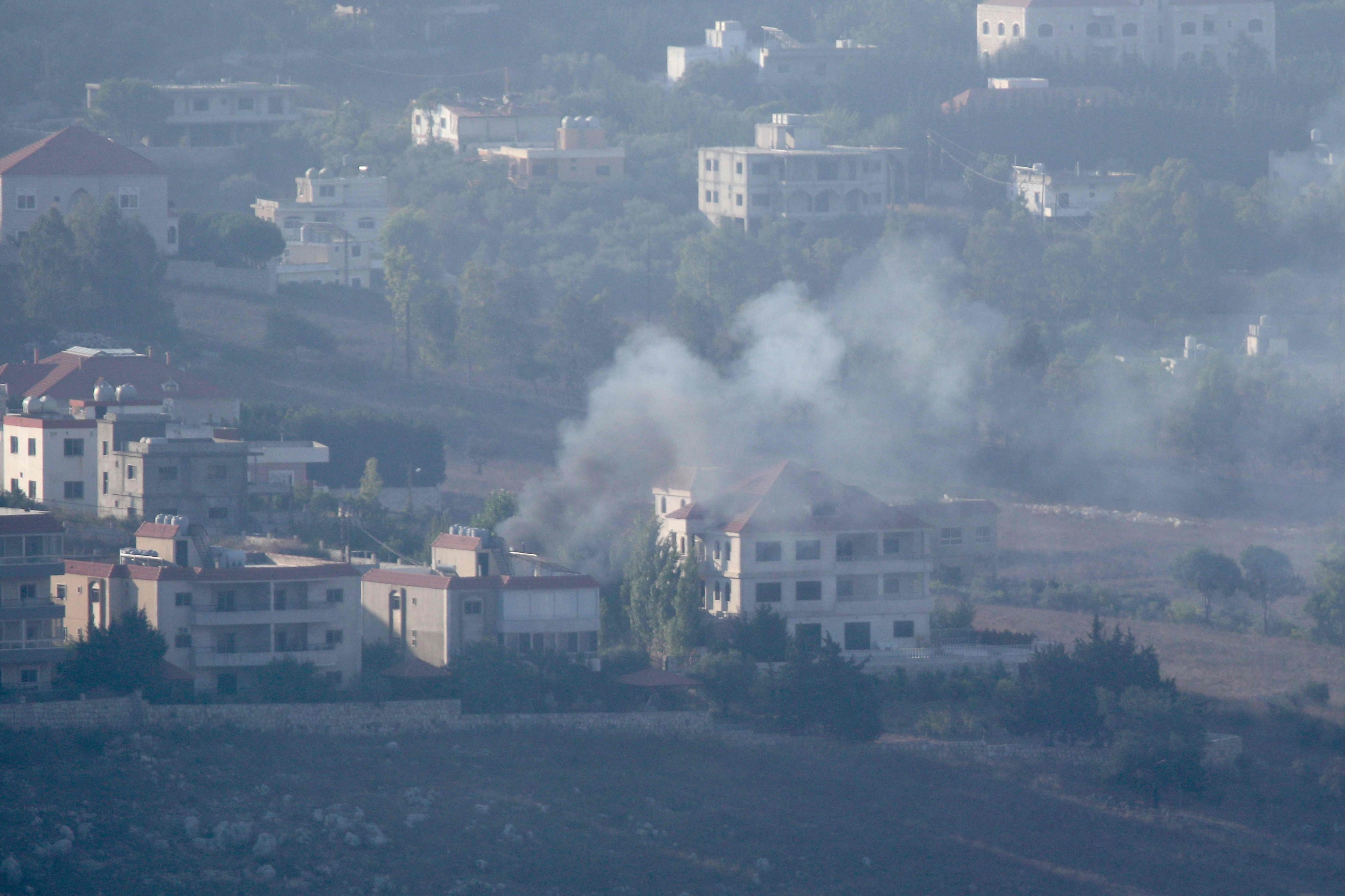 Smoke billows from an area targeted by an Israeli airstrike on the southerm Lebanese village of Khiam on Sunday. Photo: AFP