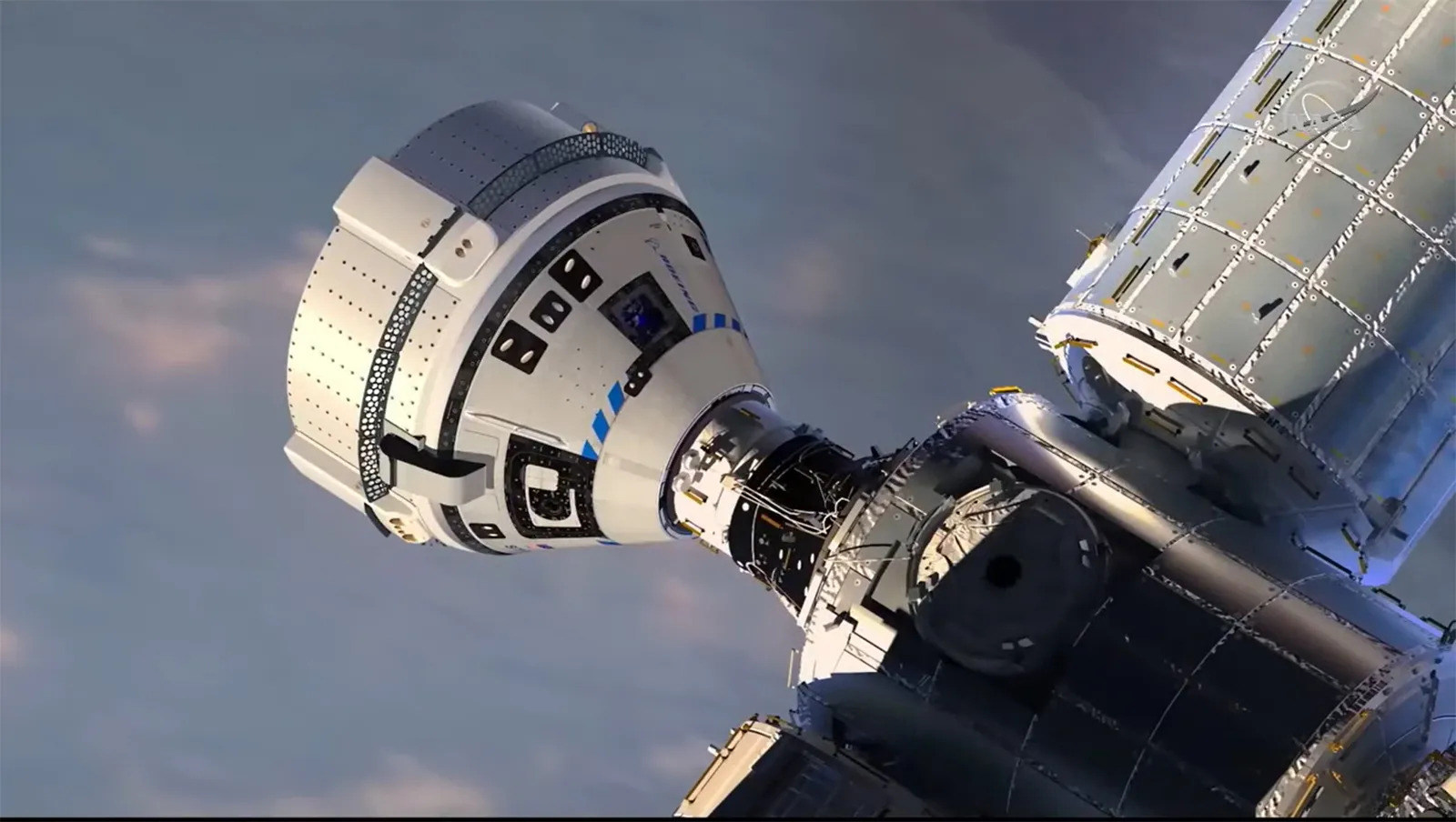 The Boeing CST-100 Starliner is shown docked to the International Space Station. Image: Boeing via TNS