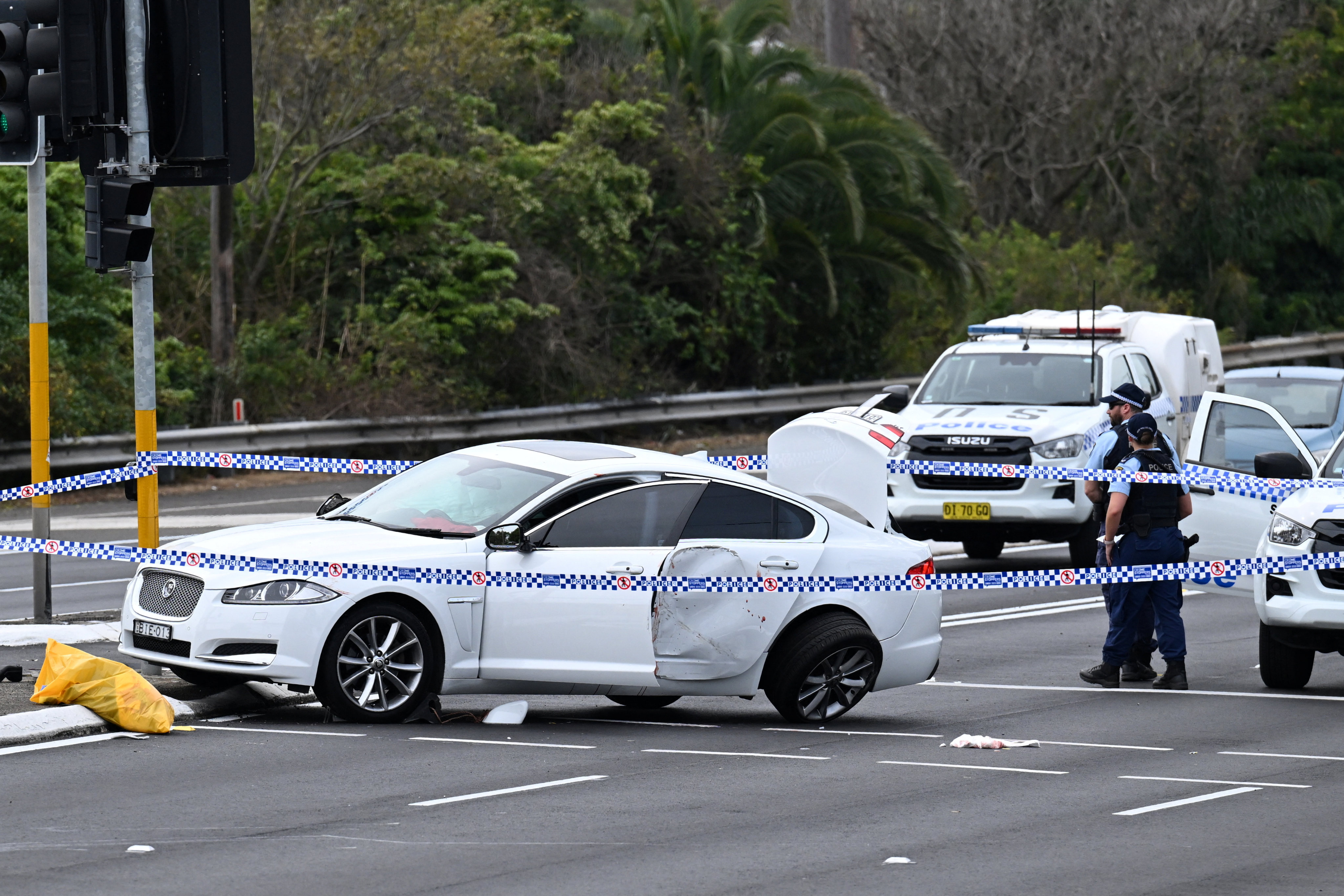 Emergency services responded to an incident where four people including a police officer have been injured following a crash and suspected stabbing in Engadine, Sydney, on August 25. Photo: AAP via Reuters