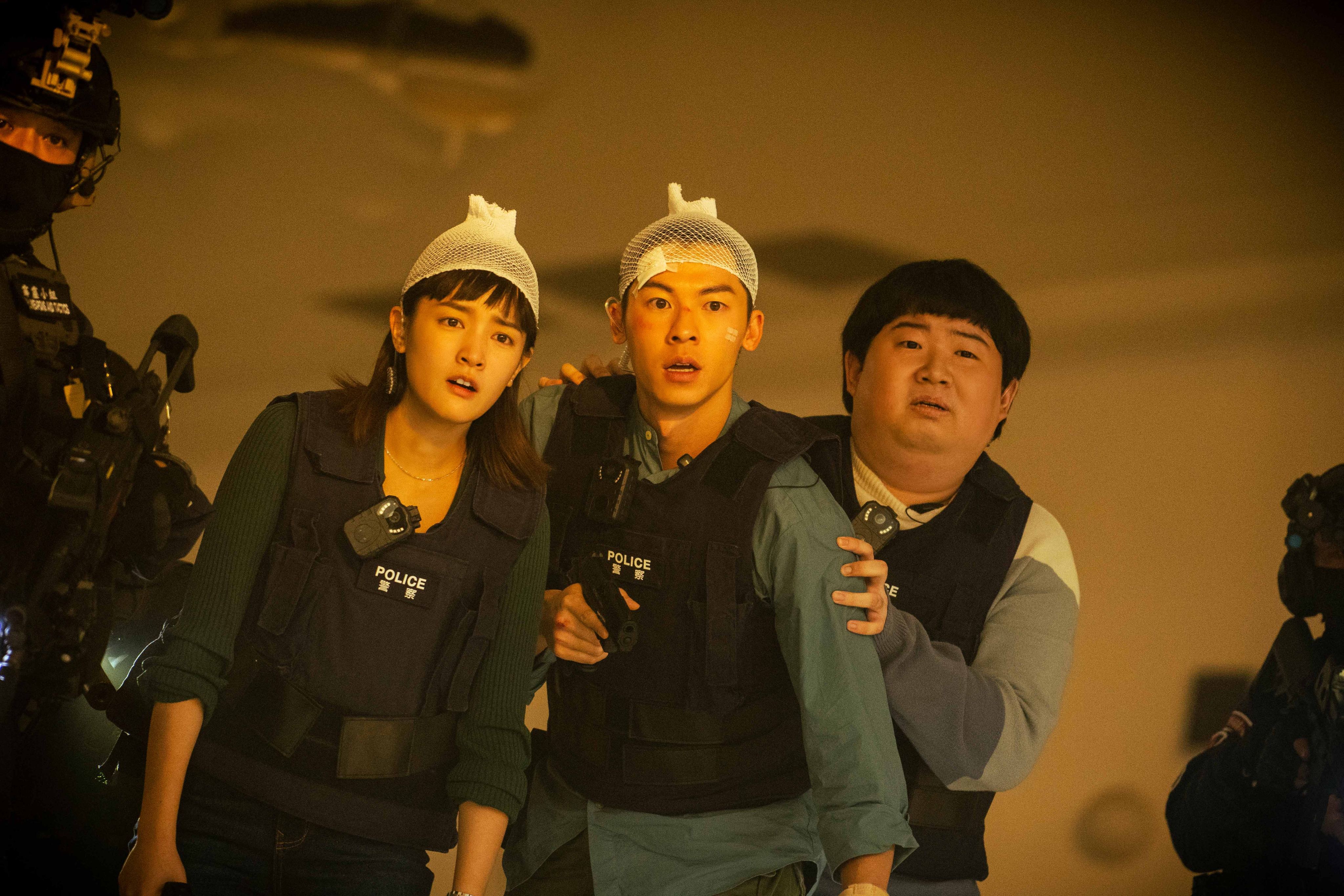 (From left) Gingle Wang, Greg Hsu and Flower Chen in a still from GG Precinct. Photo: Netflix