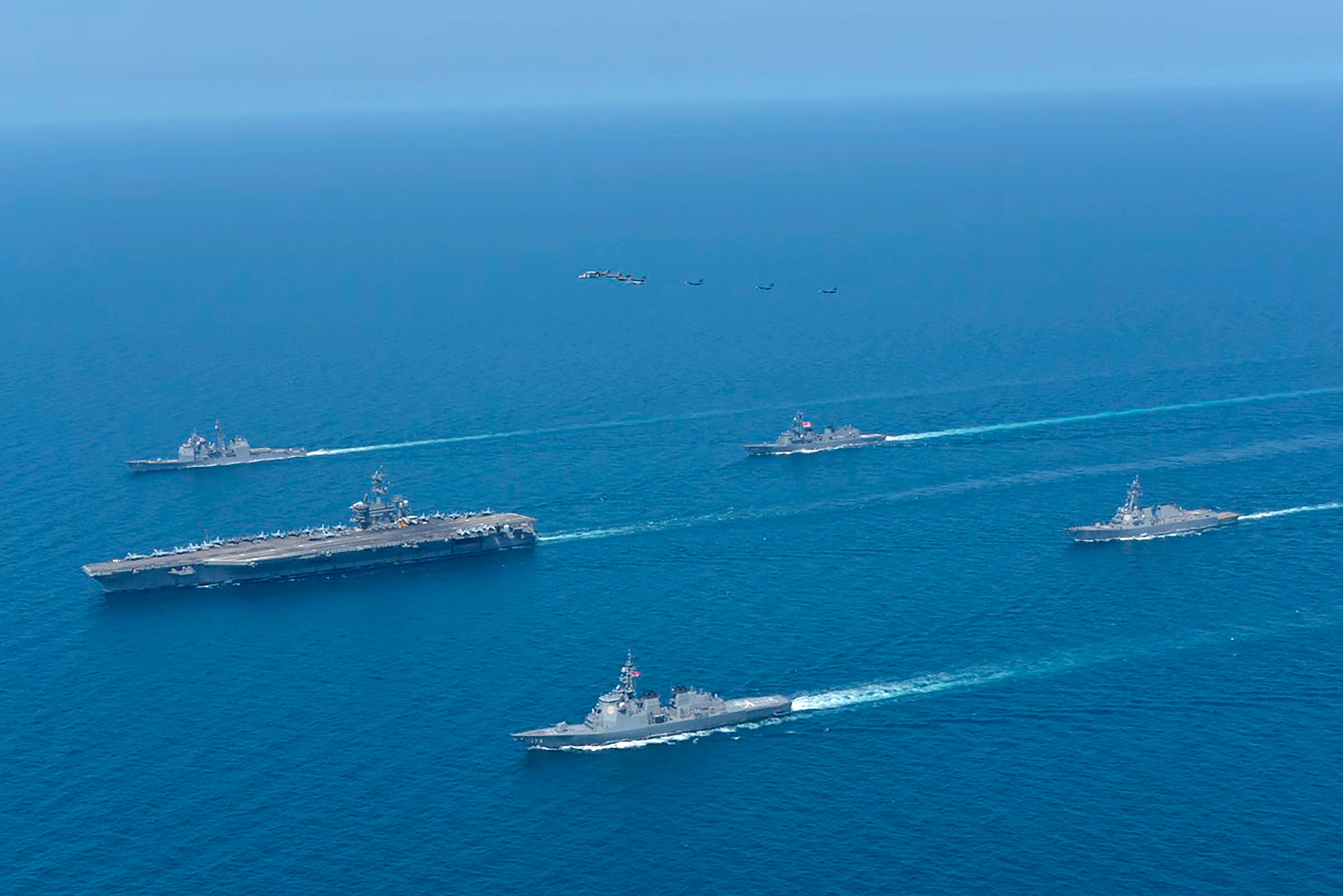 US and Japanese warships pictured during a joint exercise. Photo: AP