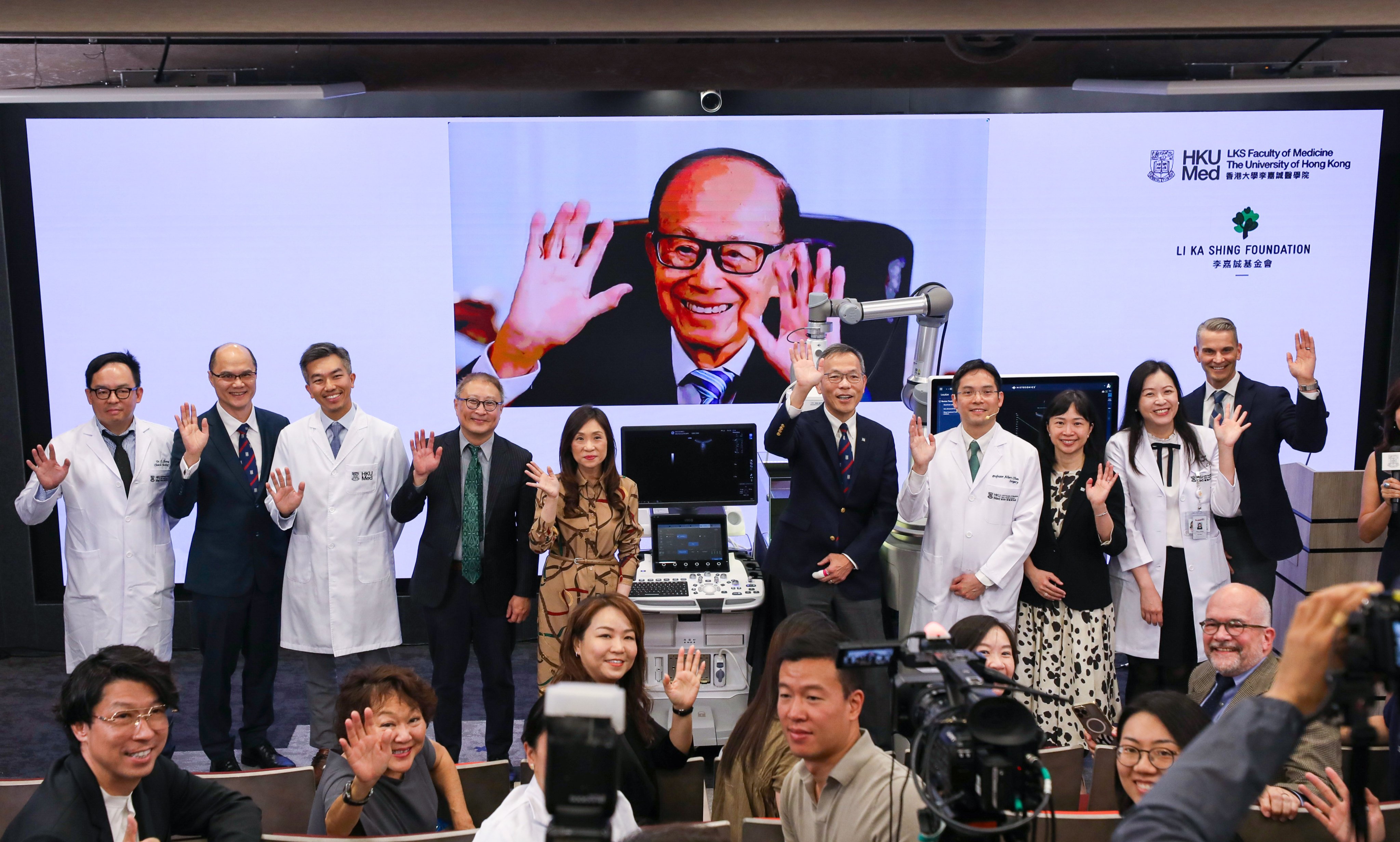 Business magnate Li Ka-shing (centre) also made a virtual appearance at the ultrasound medical device’s unveiling on Tuesday. Photo: Xiaomei Chen