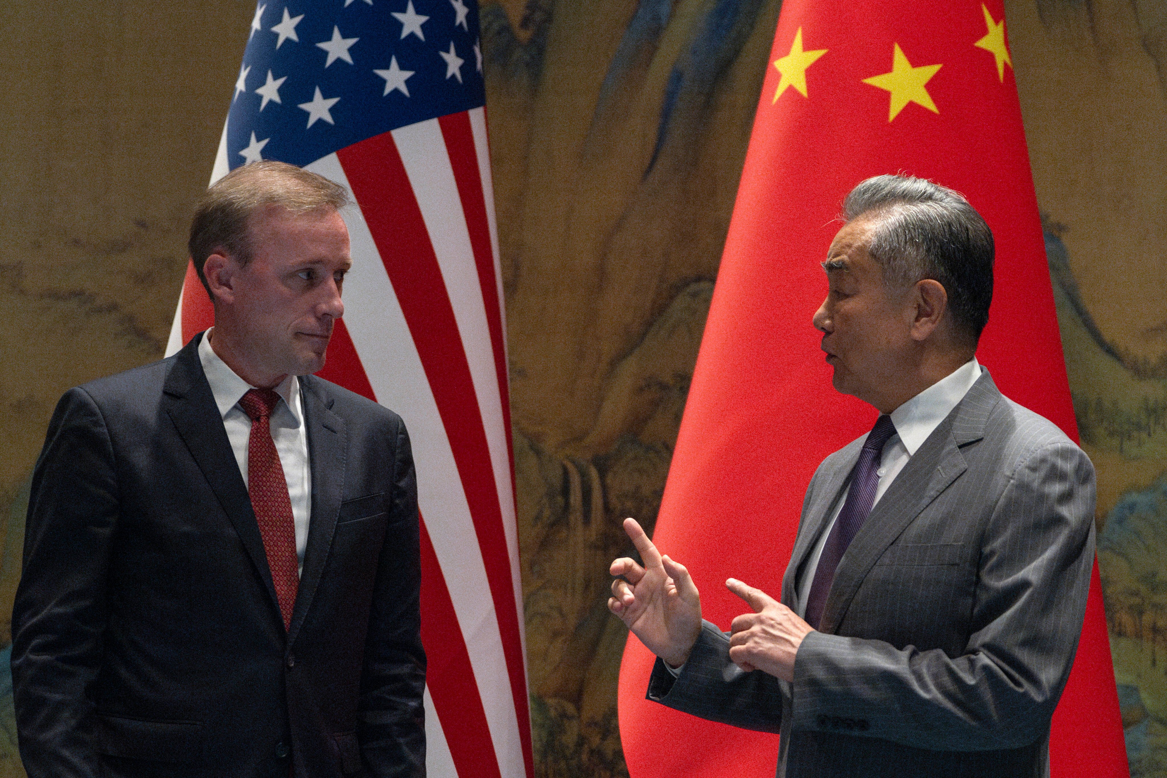 White House national security adviser Jake Sullivan and Wang Yi, China’s top diplomat, prepare to head in for talks in Beijing on Tuesday, the first day of Sullivan’s three-day visit. Photo: AP