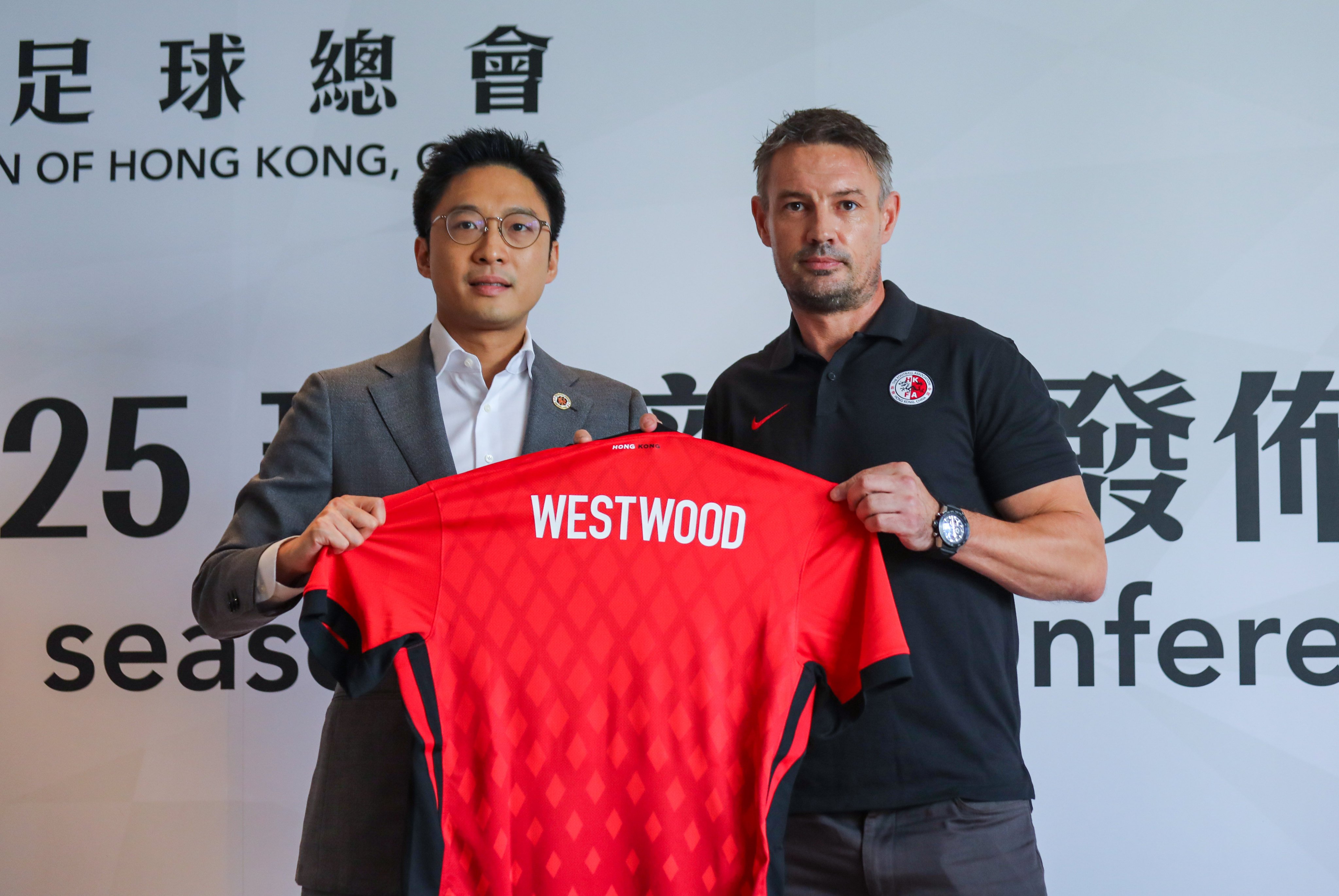 FA chairman Eric Fok with new head coach Ashley Westwood on Wednesday. Photo: Xiaomei Chen