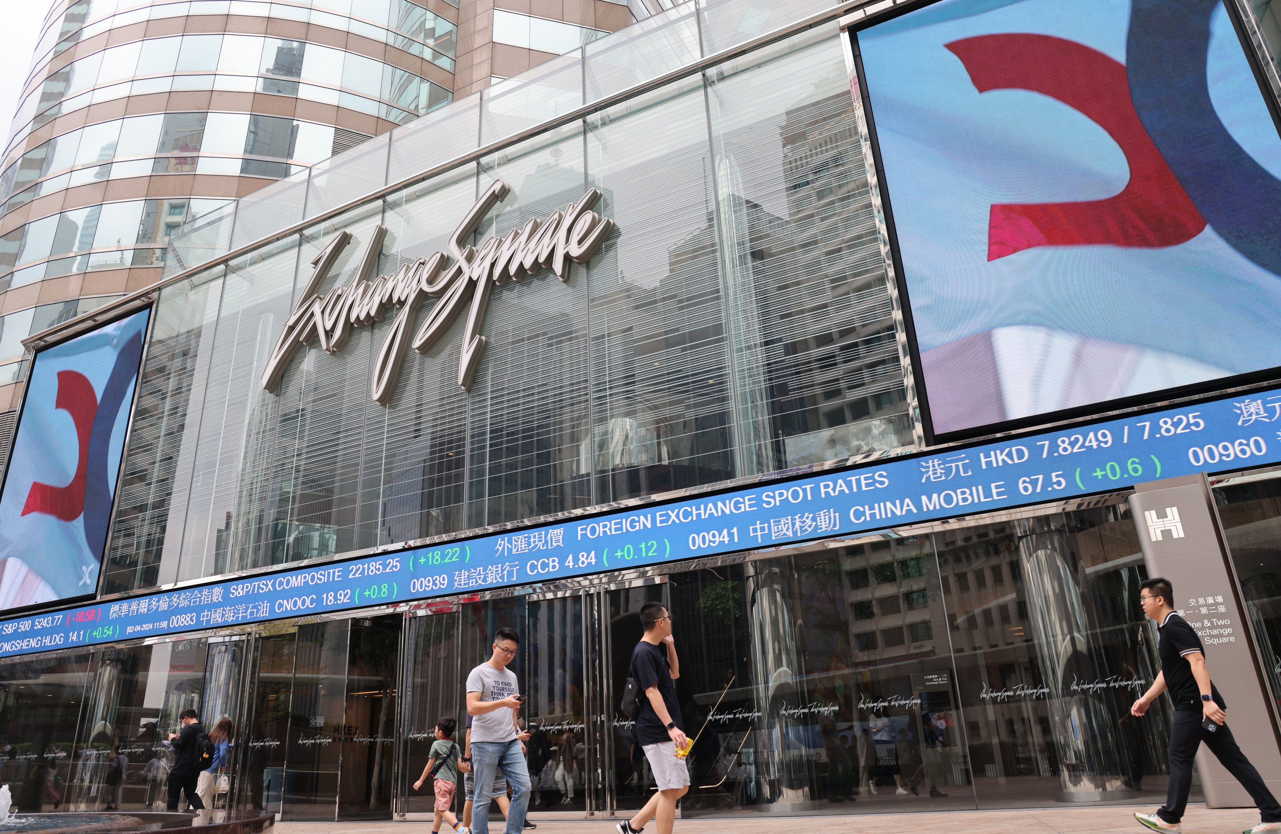 Stock indices and prices seen outside the Exchange Square in Central in April 2024. Photo: Jelly Tse.