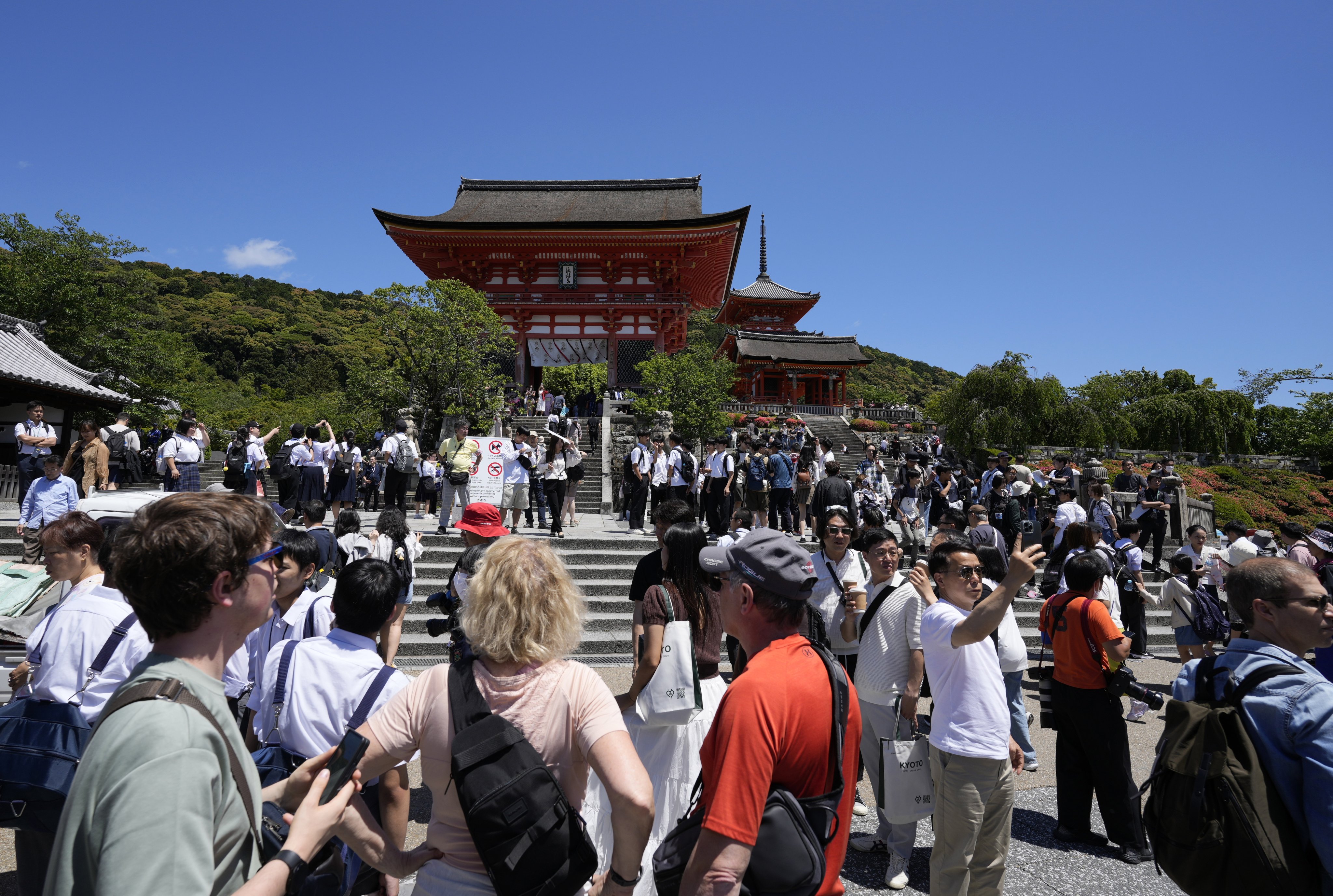 Tourists at Kiyomizu-dera temple in Kyoto, where authorities have banned visitors from entering certain streets. With global tourism on track to break records in 2024, residents of some of the world’s most visited places are being left disgruntled as the crowds bring problems. Photo: EPA-EFE