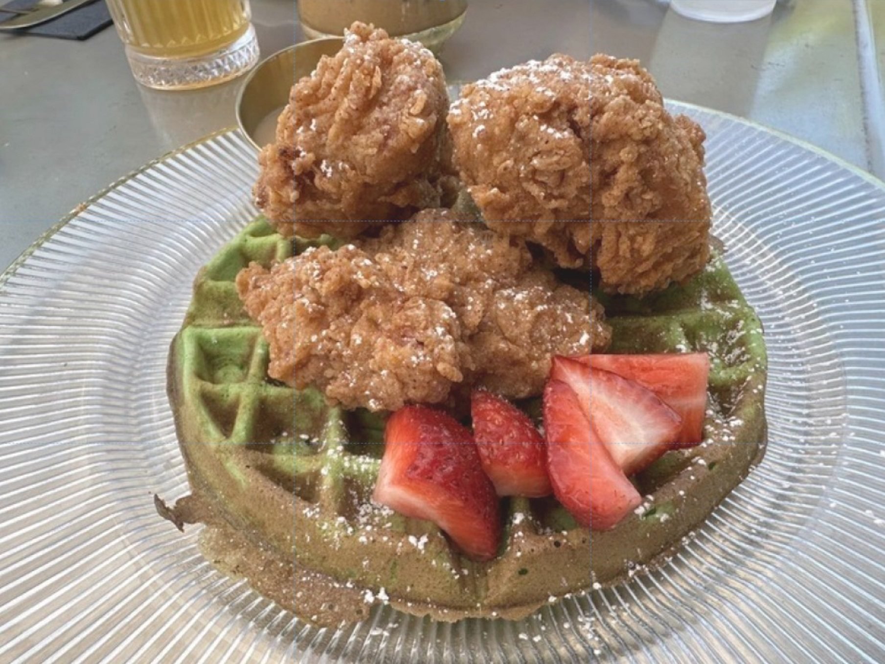 Resting Brunch Face, featuring a pandan waffle, fried chicken and Vietnamese coffee syrup, at brunch spot Breaking Dawn. Asian-American chefs are cooking up twists on traditional Western dishes to give the midmorning meal new meaning. Photo: AP