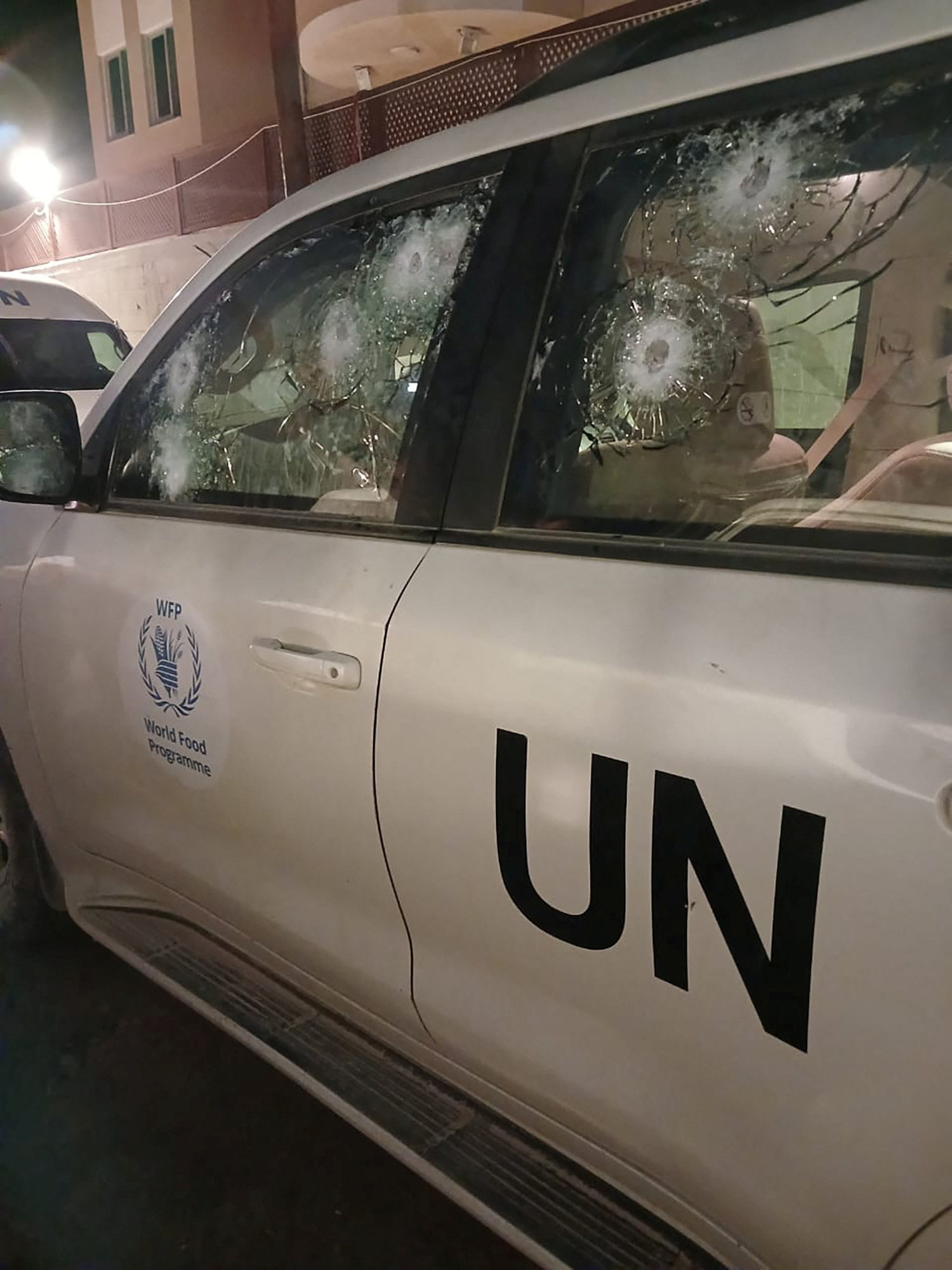 Bullets hit one of the armoured vehicles, but no one in it was hurt. Photo: World Food Programme via Reuters