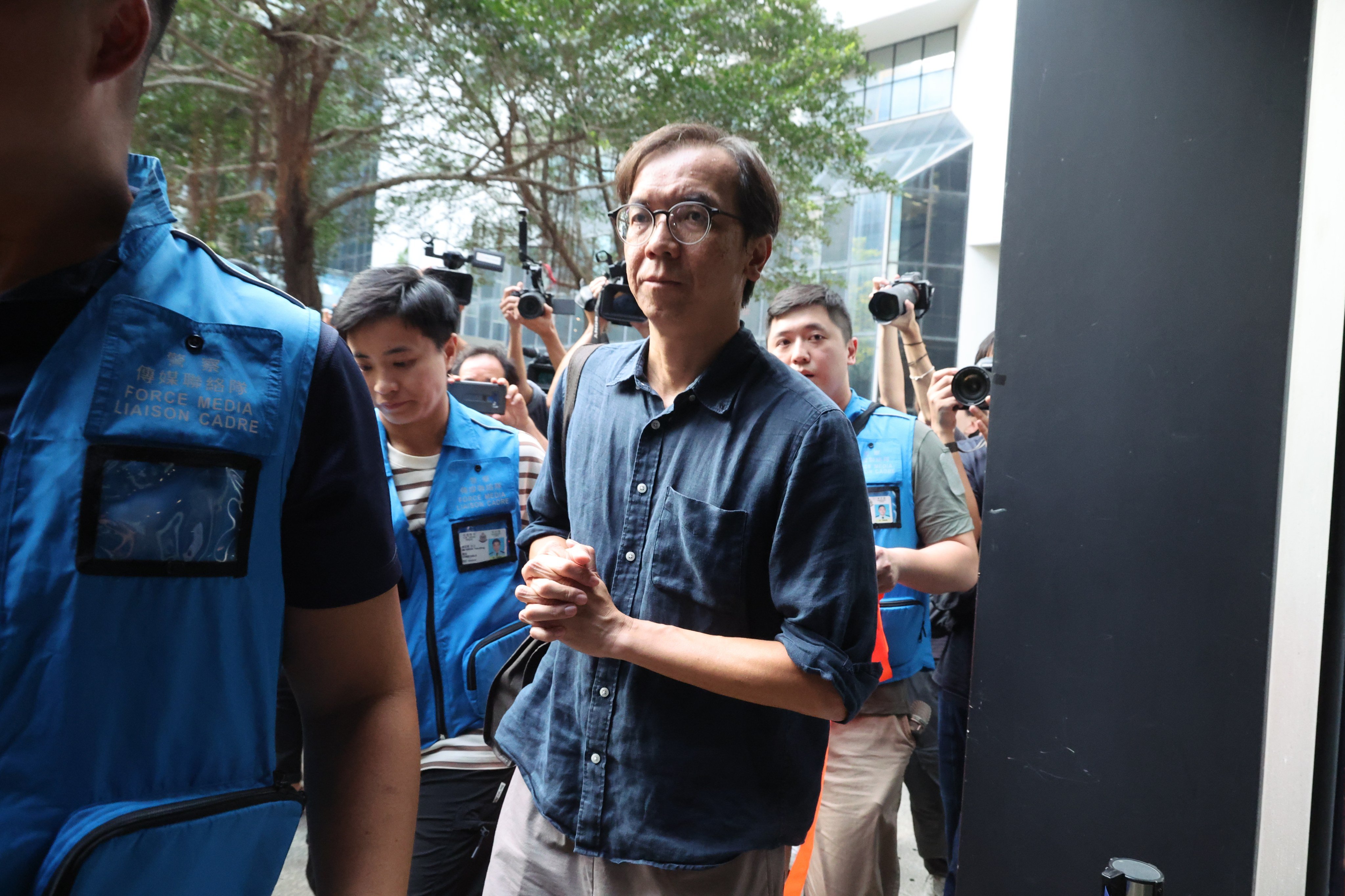 Former Stand News’ editor-in-chief Chung Pui-kuen leaves Wan Chai Court on Thursday after being convicted of sedition. Photo: Dickson Lee