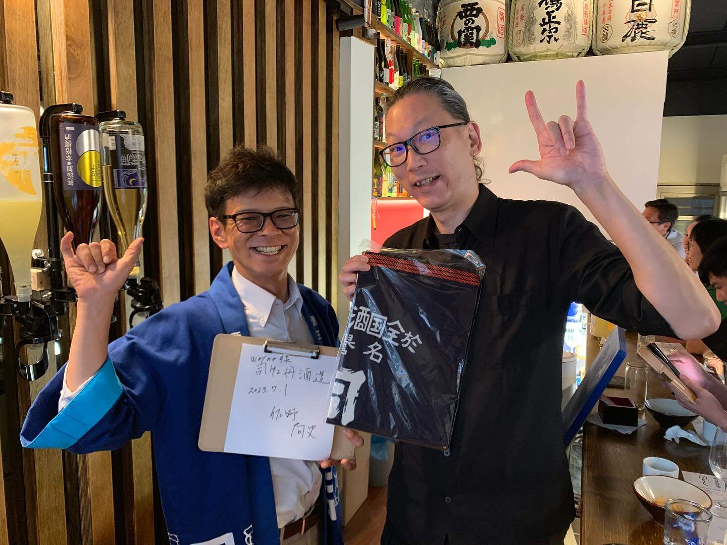 Award-winning Taiwanese sake maker Chiang Wei (right). After his Taiwan to go Sake No. 1 made history at France’s Kura Master contest, the Taipei bar operator says he wants to share perspectives with Japanese makers. Photo: Facebook/jiangwayne.com Sake Bar Jr.
