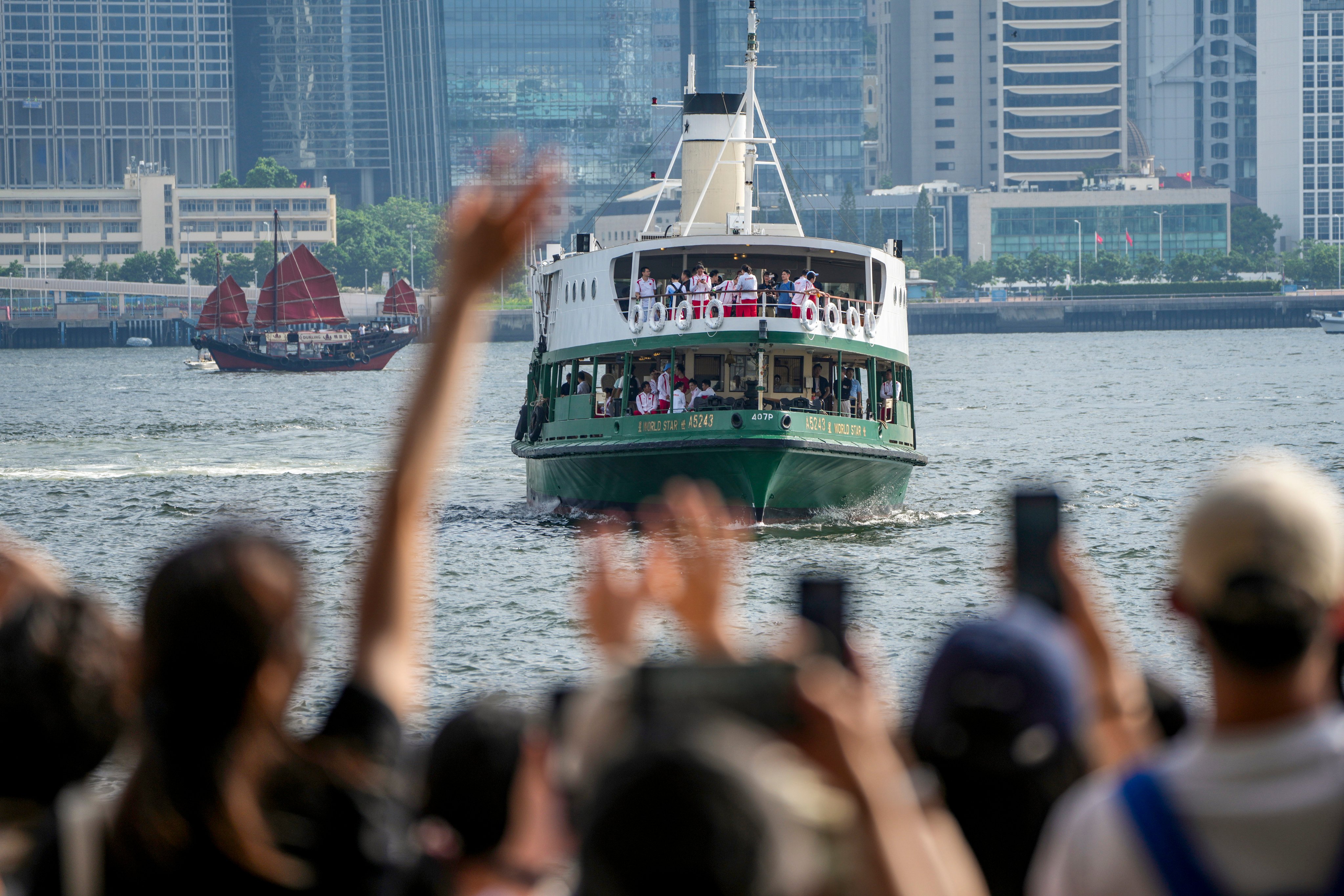 A short voyage on a Star Ferry vessel was among Friday’s  activities for the mainland Olympians. Photo: Sam Tsang