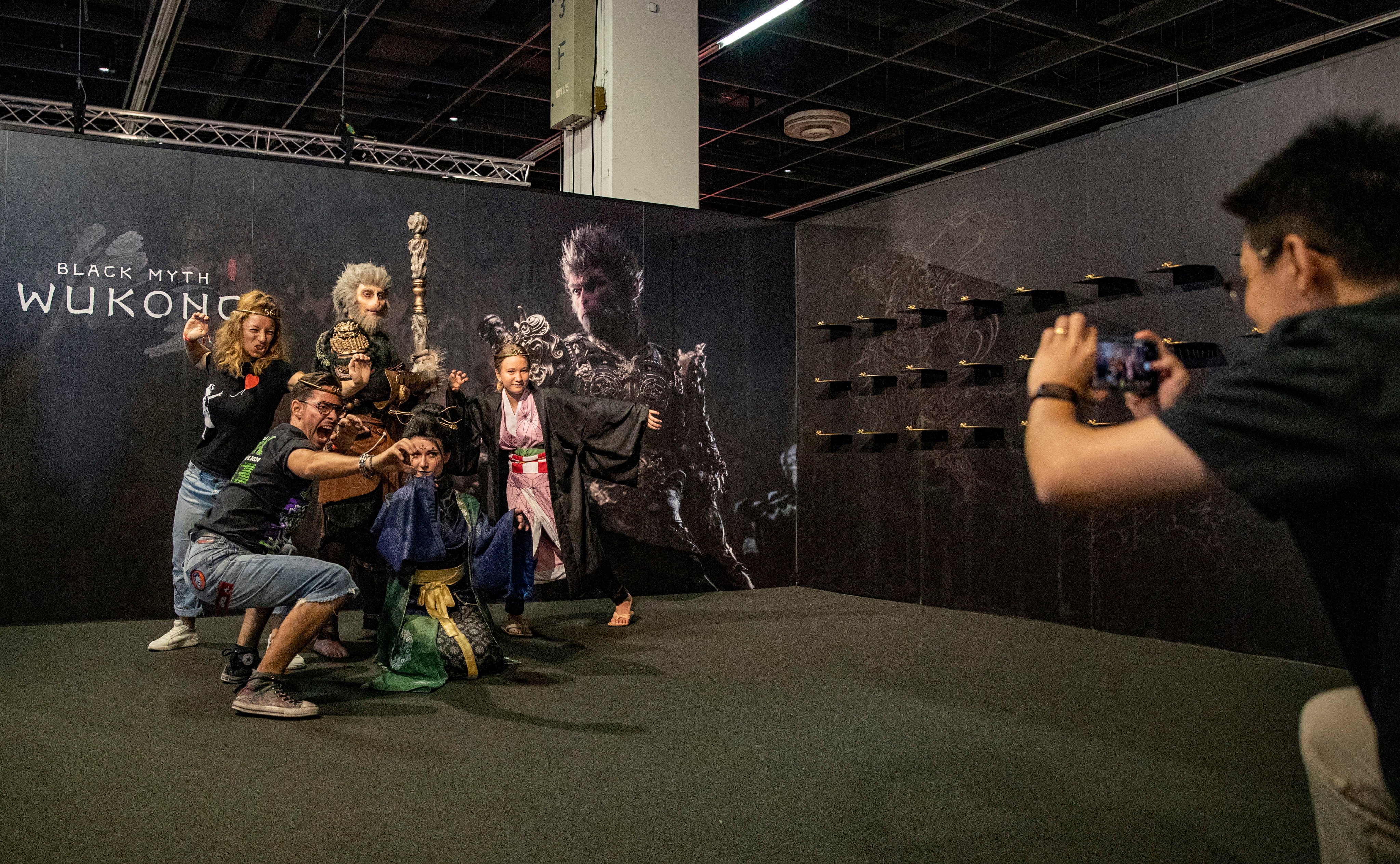 People pose for a photo at gamescom 2024 in Cologne, Germany, on August 22, following the launch of “Black Myth: Wukong”, the hit Chinese video game. Photo: Xinhua 
