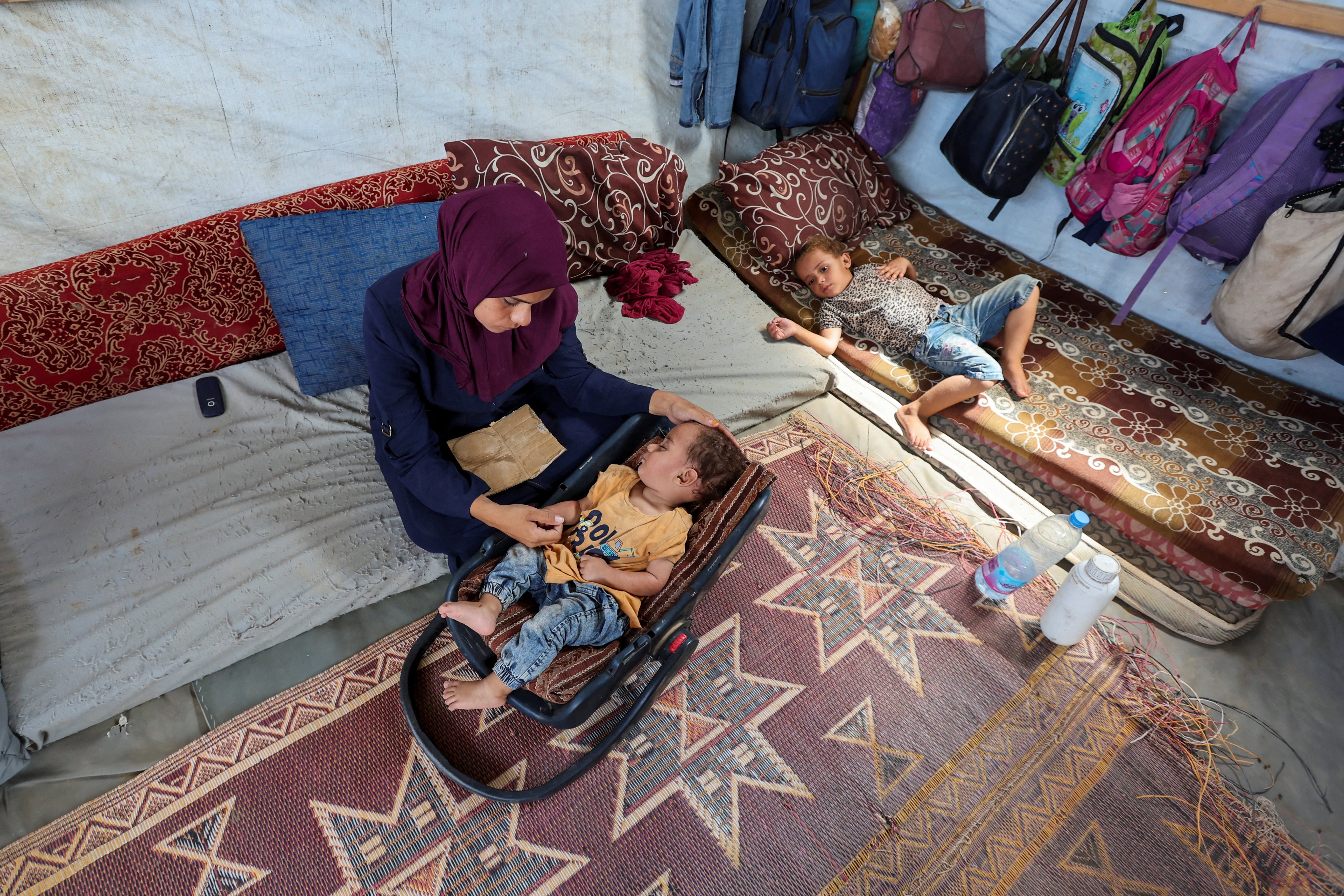 The mother of Palestinian boy Abdul Rahman Abu Al-Jidyan, who is the first person to contract polio in Gaza in 25 years. Photo: Reuters