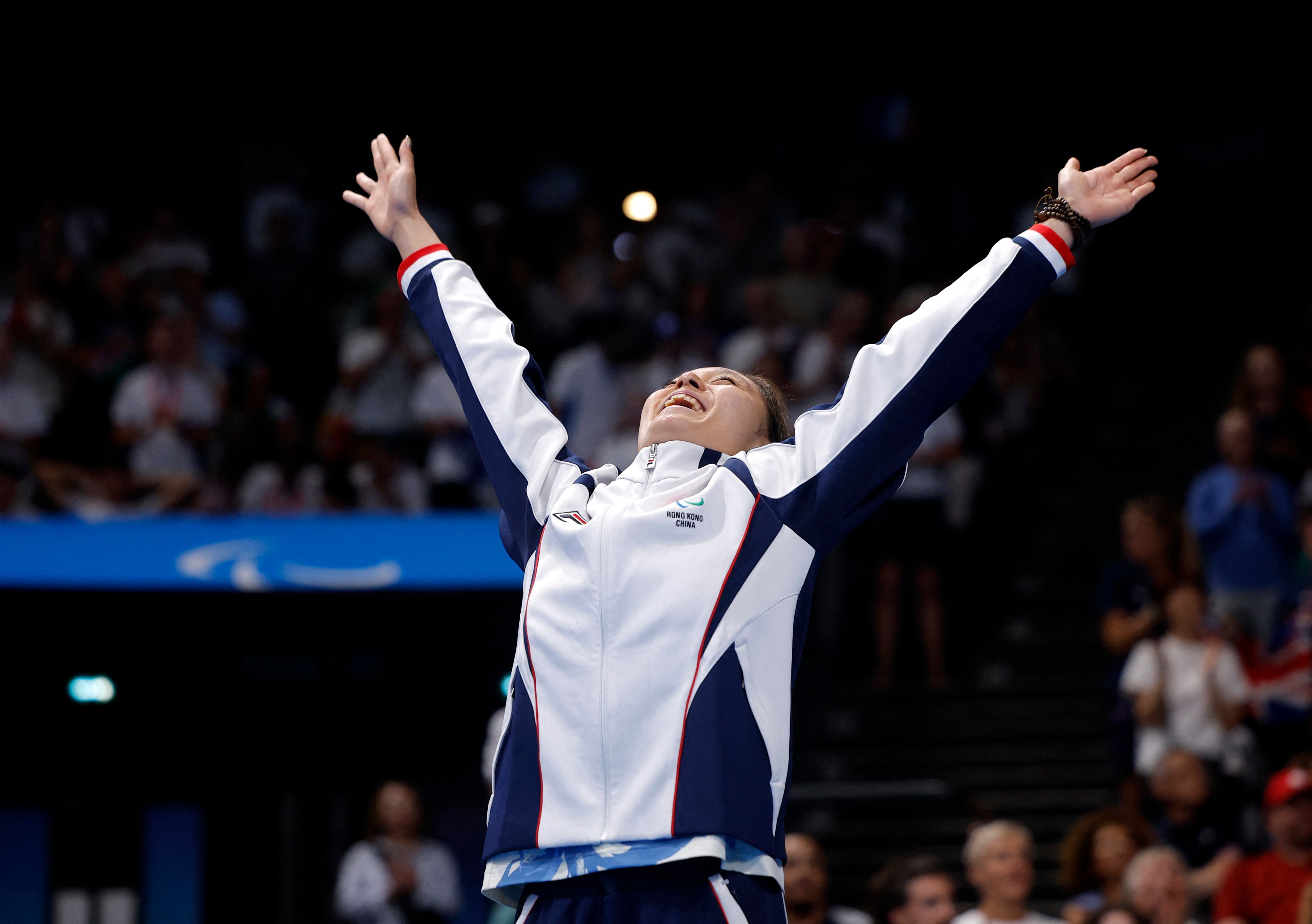 Hong Kong’s silver medallist Yui Lam Chan celebrates on the podium at the Paralympics in Paris, France. Photo: Reuters