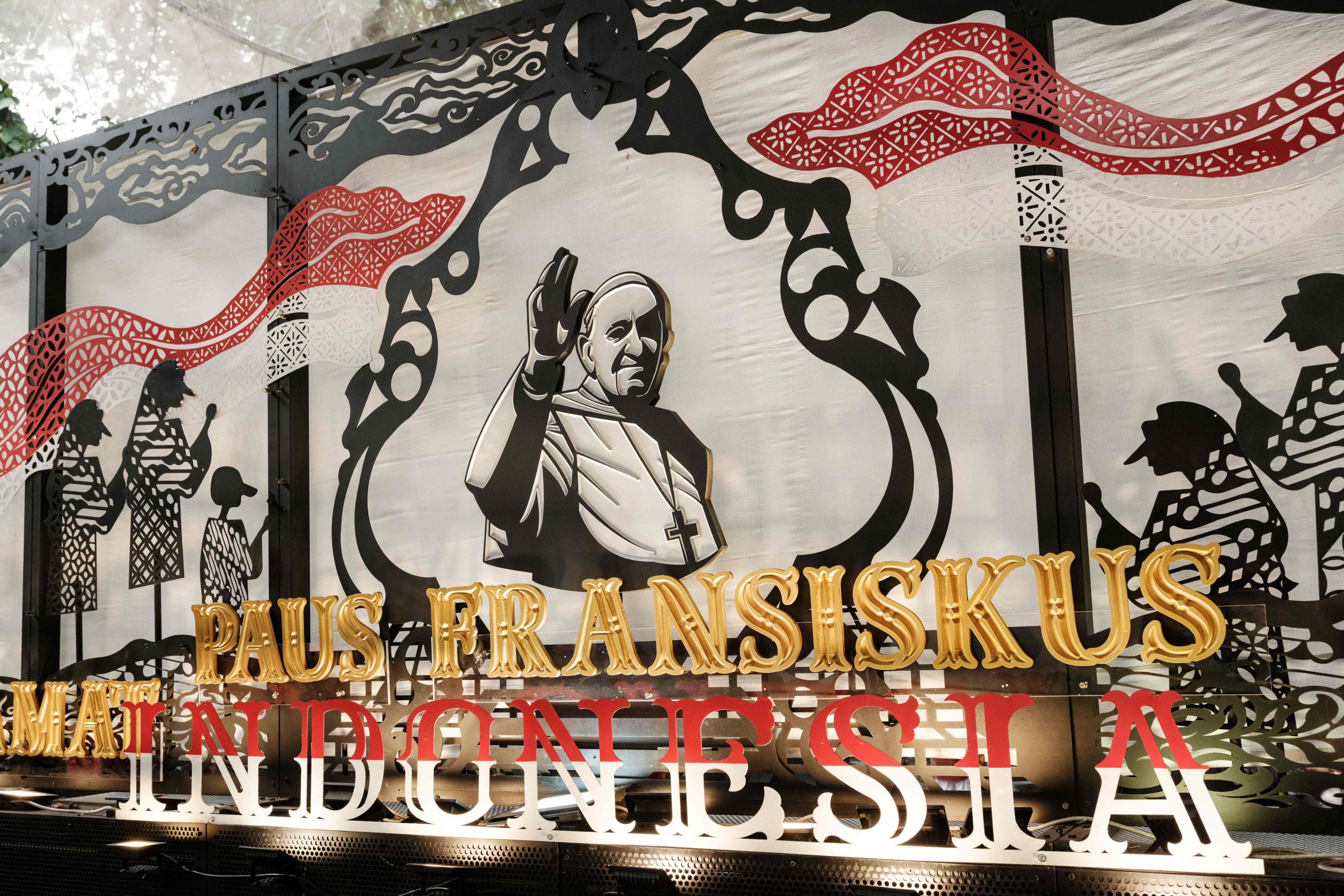 A welcoming signboard for Pope Francis is seen installed at the Jakarta Cathedral. Photo: AFP